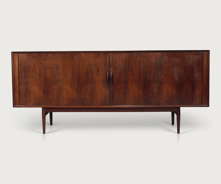 Arne Vodder Sideboard: Rosewood sideboard with tambour doors and internal shelves and drawers finished in beech. Designed by Arne Vodder and manufactured by Sibast, Denmark. Height:86cm Depth:50cm Width: 200cm