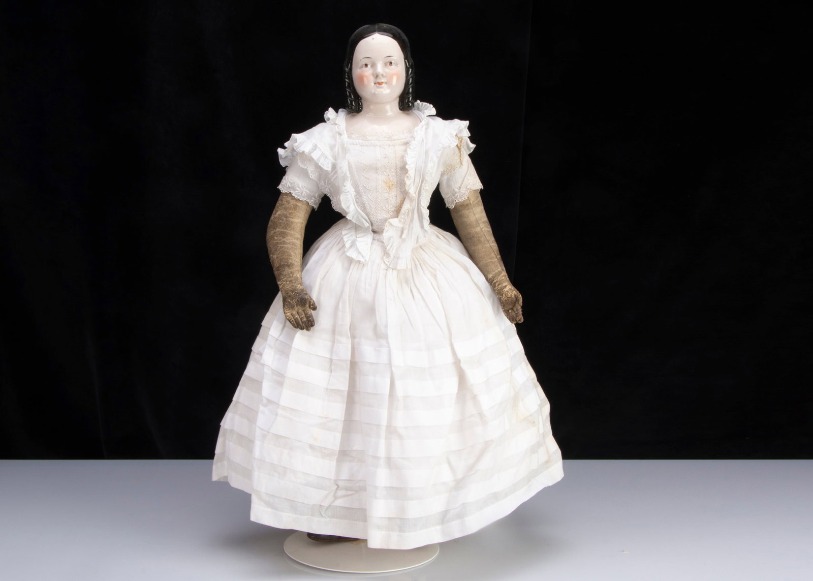 A rare 19th century German pink-tinted china shoulder head girl, (1 of 3)