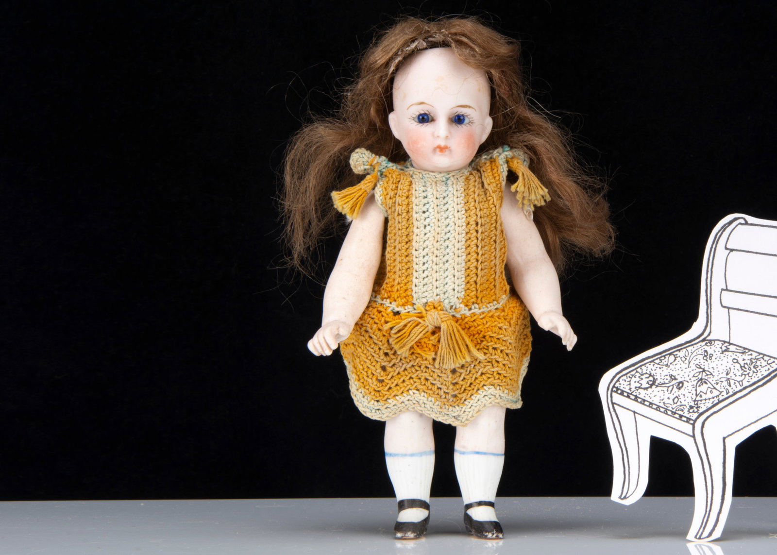 A larger scale French all-bisque dolls’ house doll, (1 of 2)