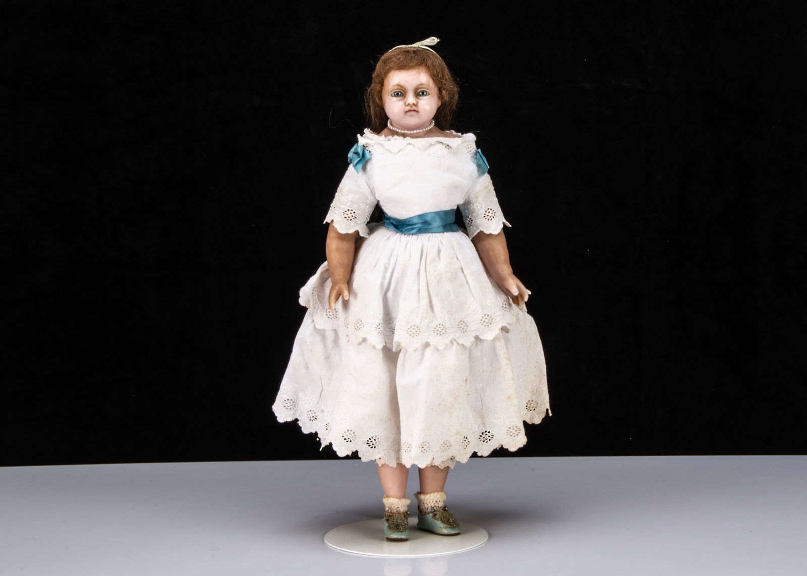 A 19th century English poured wax child doll, (1 of 2)