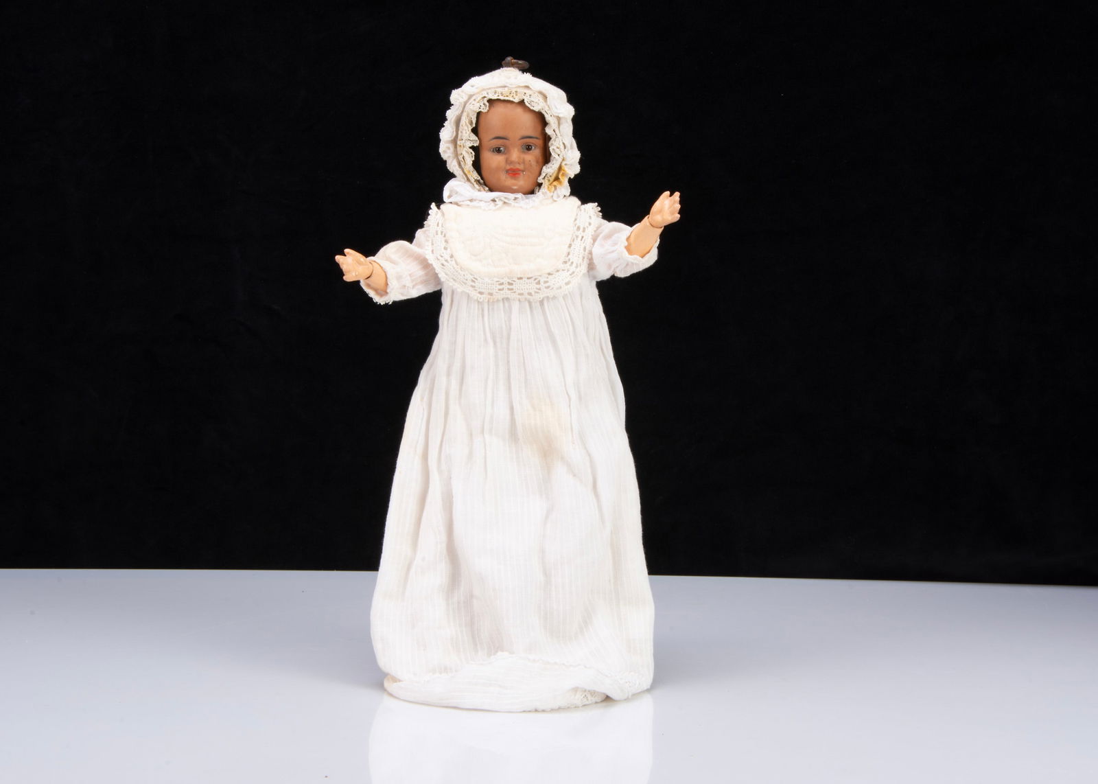 A rare Bergner three faced and raced bisque headed doll, (1 of 4)