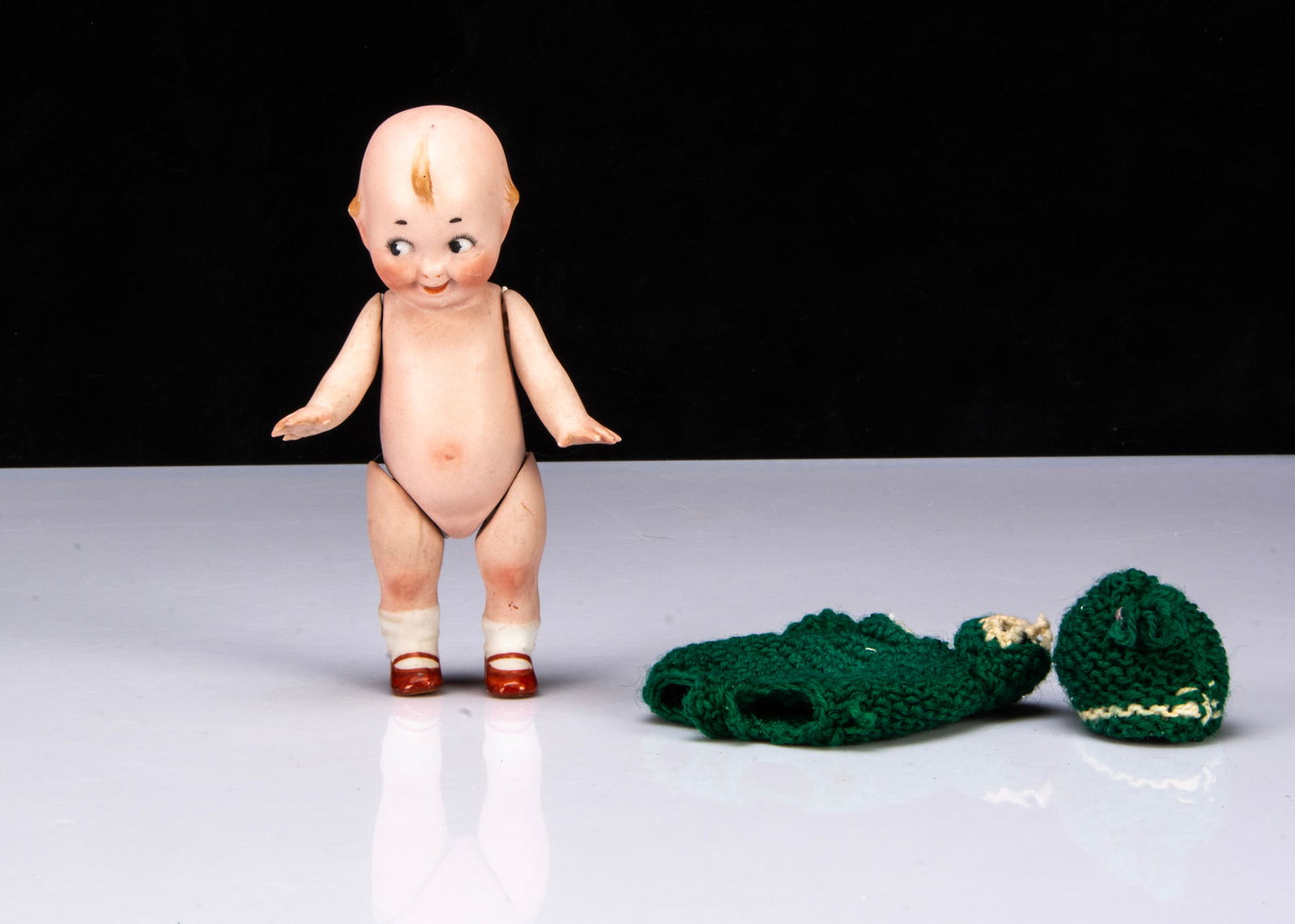 A small German all-bisque googly eyed doll, (1 of 1)