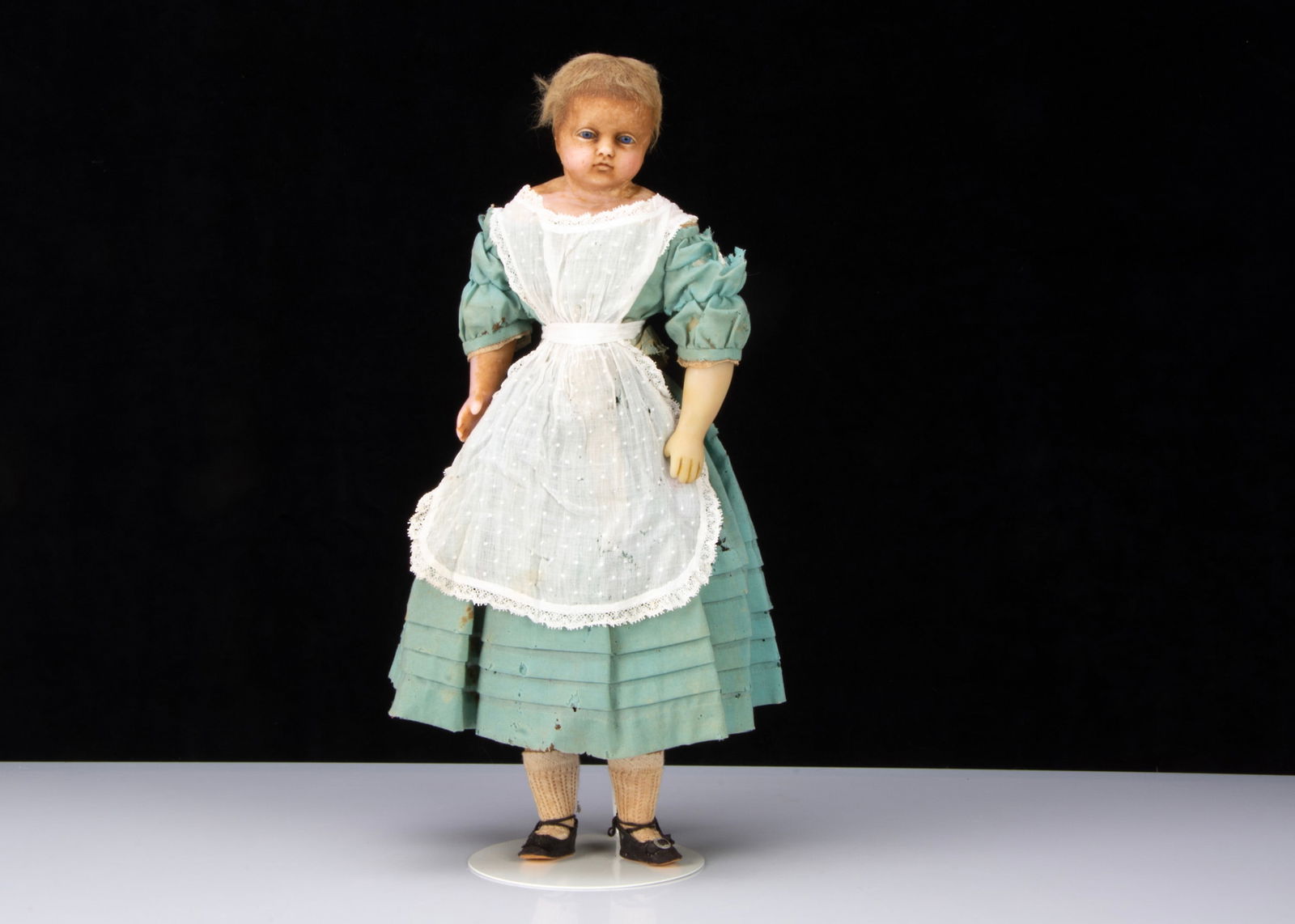 A mid 19th century English poured wax child doll, (1 of 2)