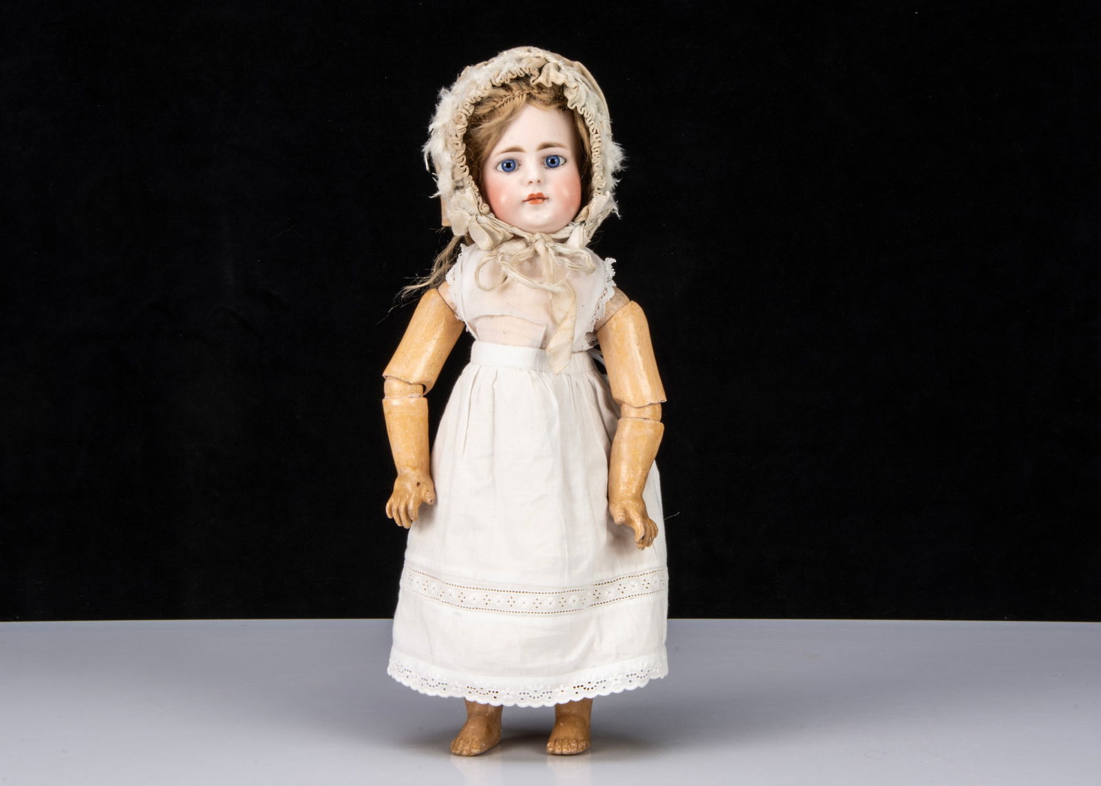 A late 19th century German bisque headed doll impressed 51-7, (1 of 2)