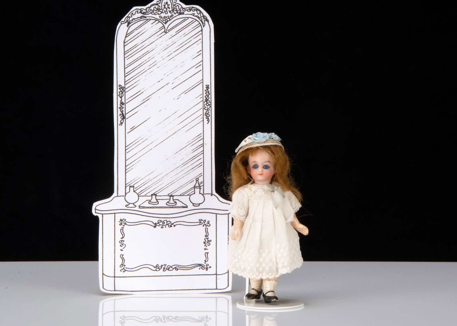 A German bisque headed dolls’ house doll, (1 of 2)
