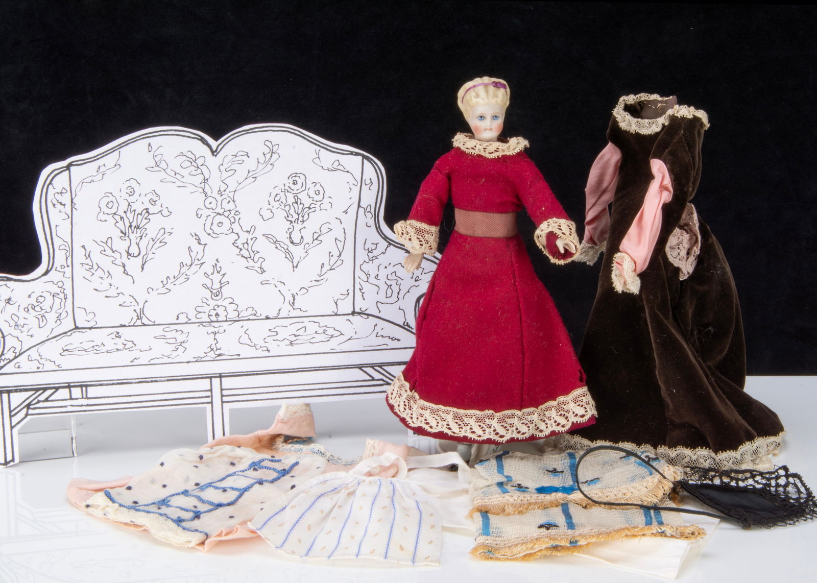 A small Simon & Halbig bisque swivel shoulder-head lady doll with trousseau, (1 of 3)