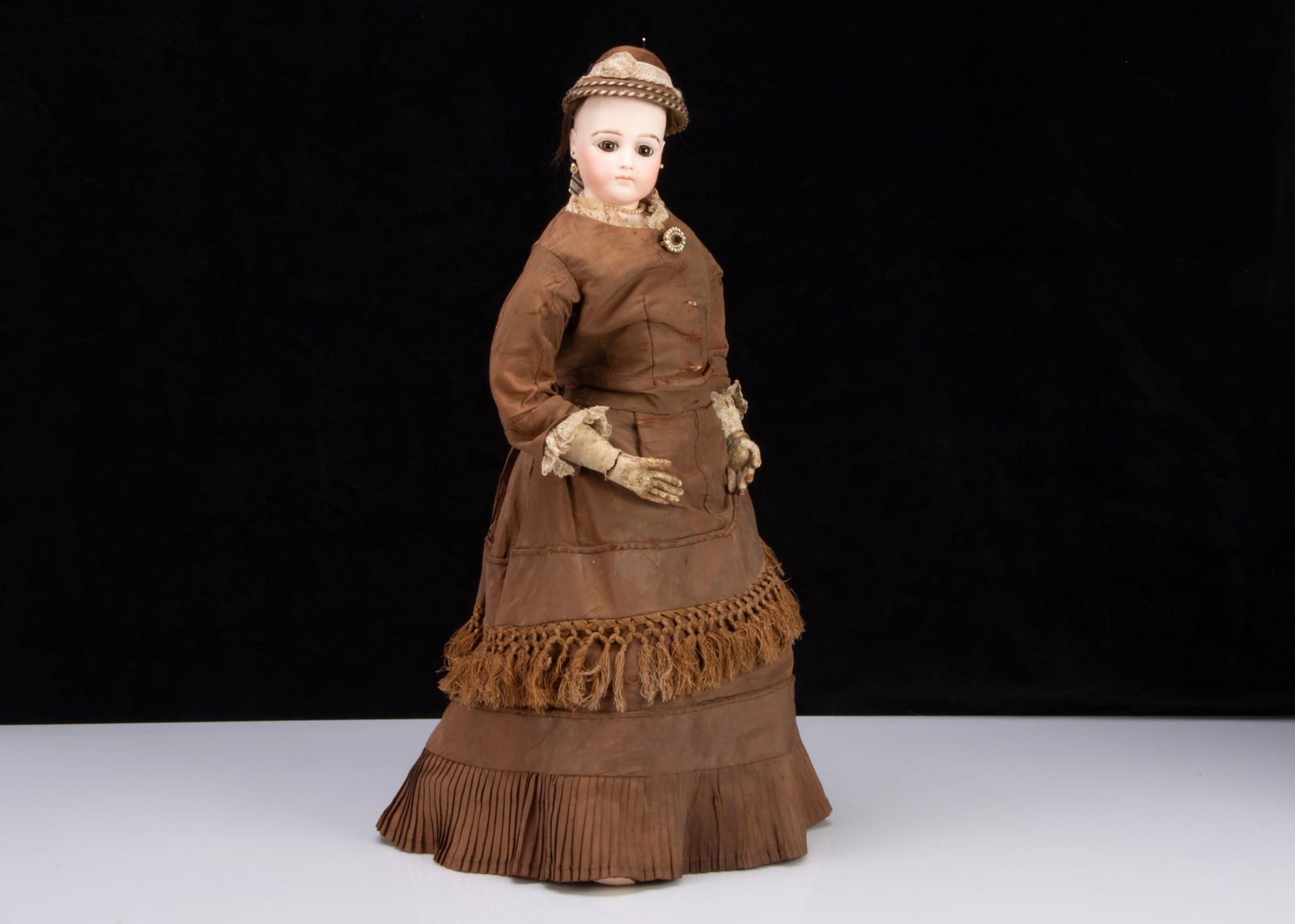 A large late 19th century Jumeau pressed bisque swivel-head fashionable doll, (1 of 2)
