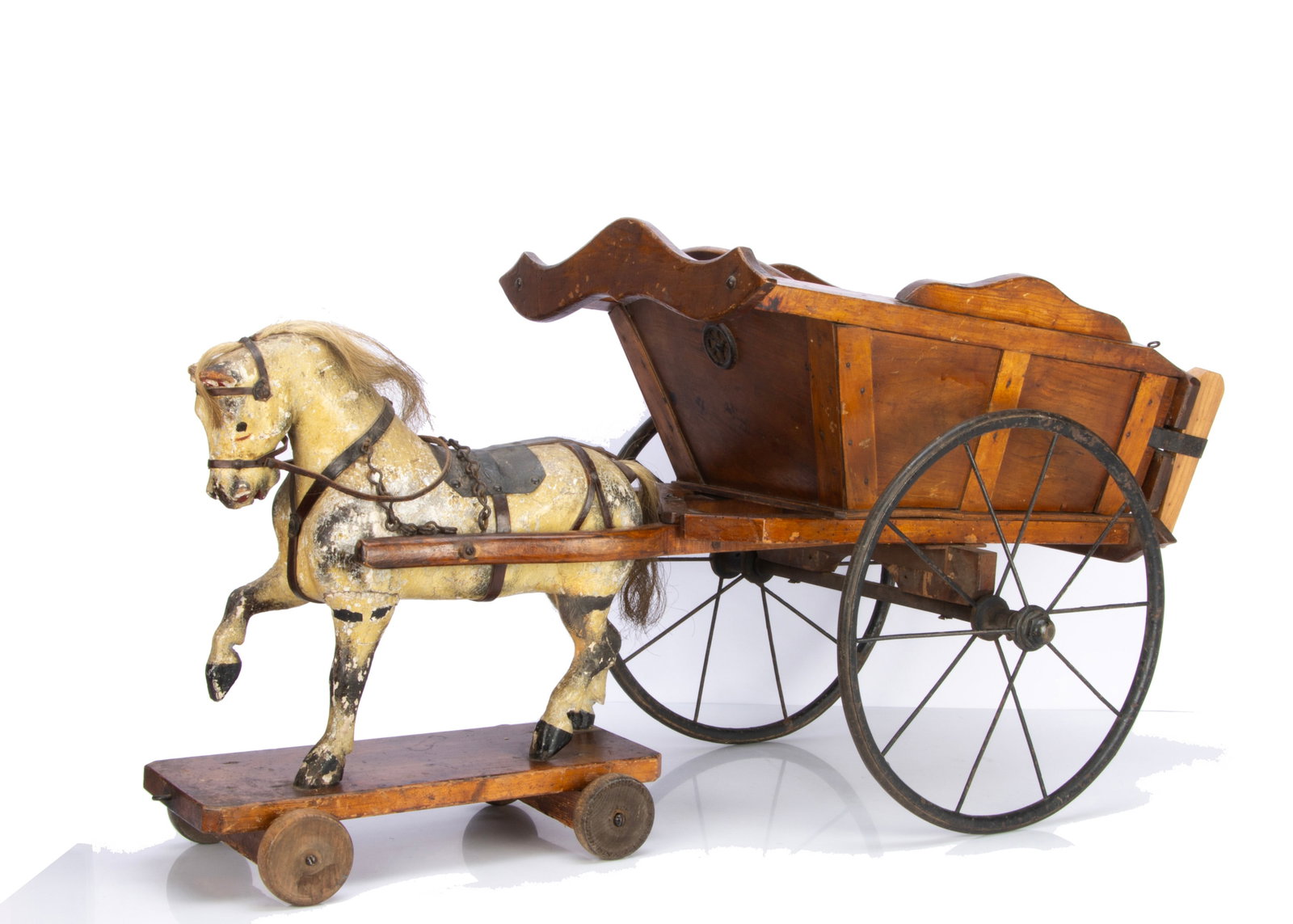 An early 20th century English carved and painted wooden horse and cart,: An early 20th century English carved and painted wooden horse and cart, probably G & J LIne, painted dappled grey, horsehair mane and tail, leather tack, standing on platform with wooden wheels, varni