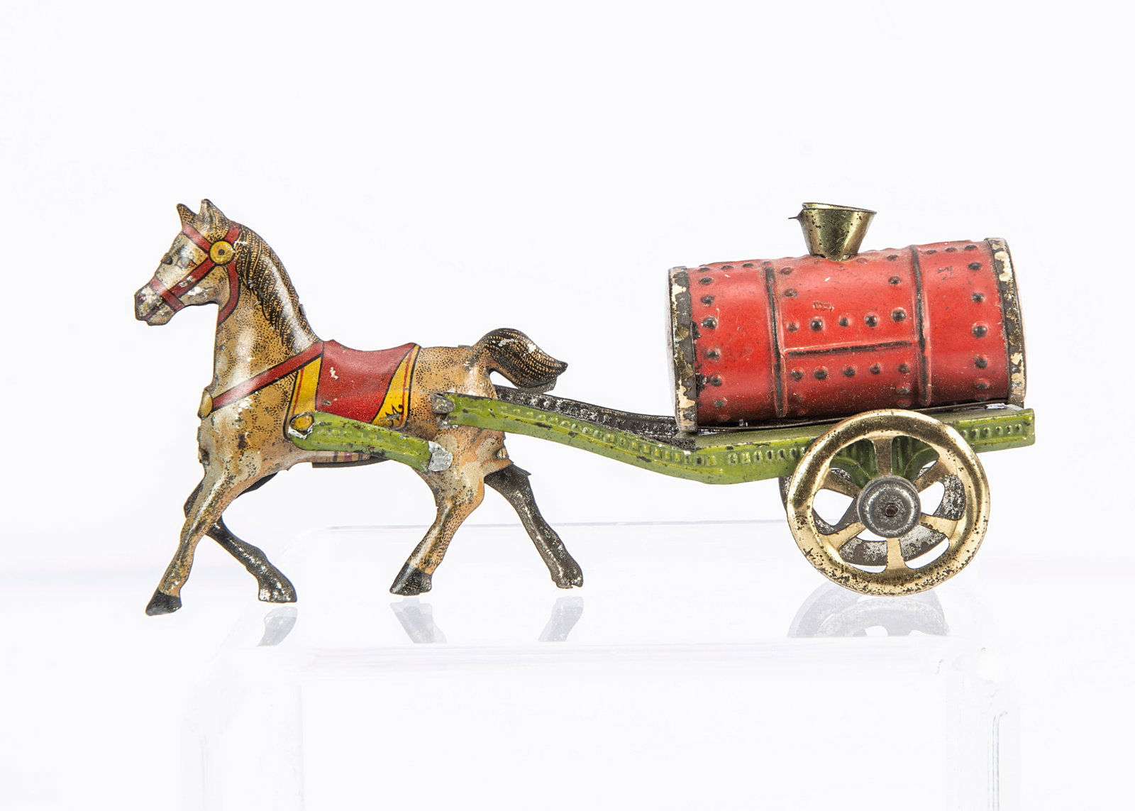 An early Meier Penny Toy horse drawn fire water carrier,: An early Meier Penny Toy horse drawn fire water carrier, with lithographed horse, red, green and gold painted cart ó4 Ωin. (11.5cm.) long (one shaft damaged, slight wear)