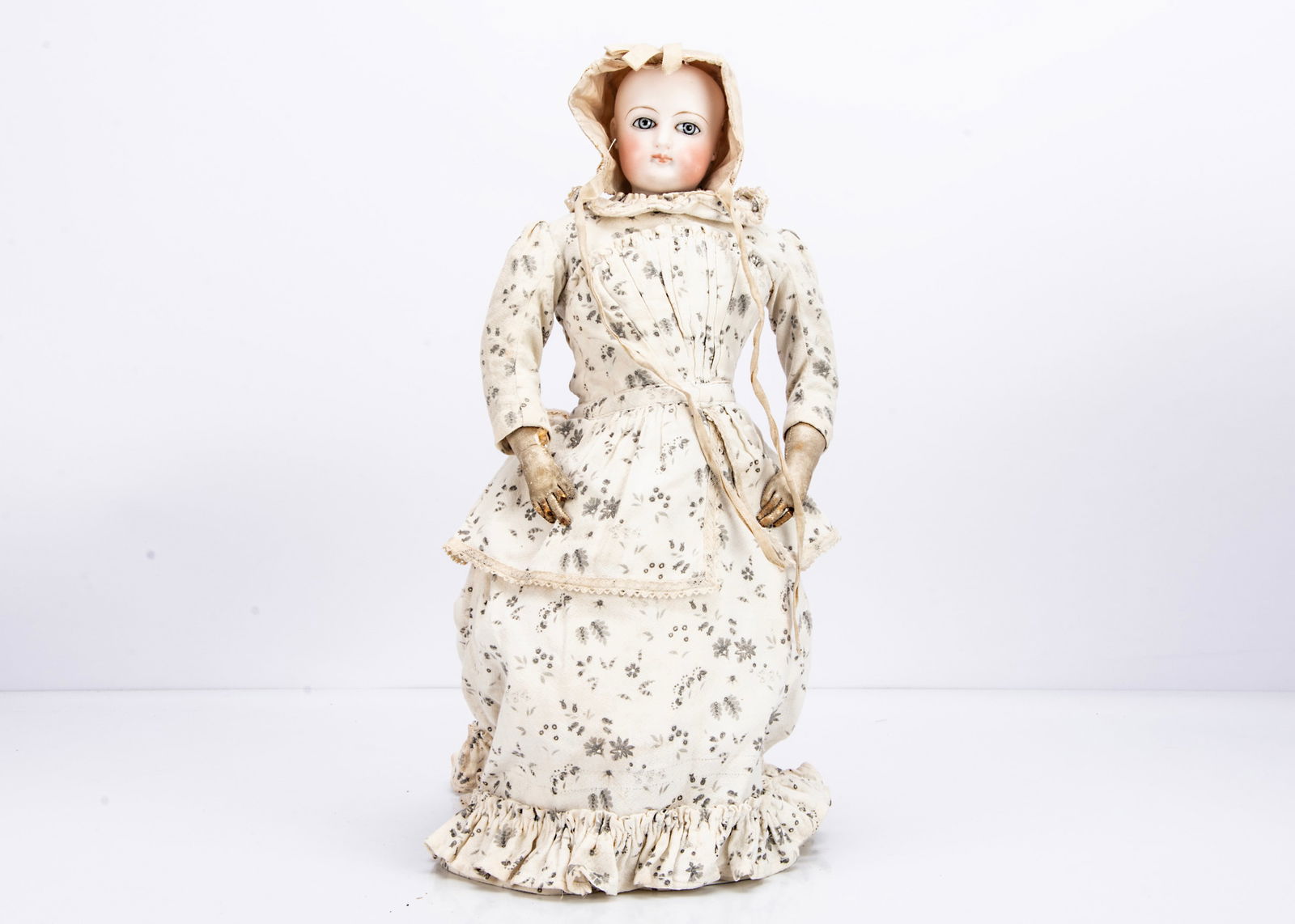 A Jumeau pressed bisque swivel head fashionable doll,: A Jumeau pressed bisque swivel head fashionable doll, with grey glass eyes with dark edge to iris, brown feather brows, cupid bow lips, pierced ears, cork pate, back of head impressed 4, bisque should