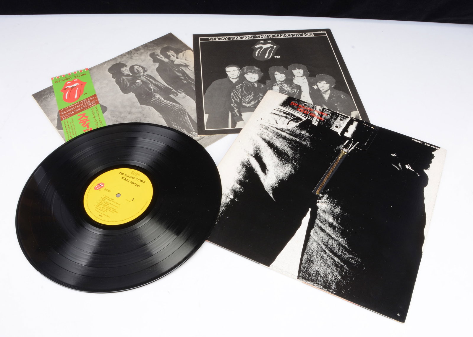 Rolling Stones LP,: Rolling Stones LP, Sticky Fingers LP - Japanese Release 1979 on EMI (ESS-63001) - Zipper Sleeve with Inner and Insert - OBI Strip cut along the bottom fold and seam split centre bottom edge of the inn