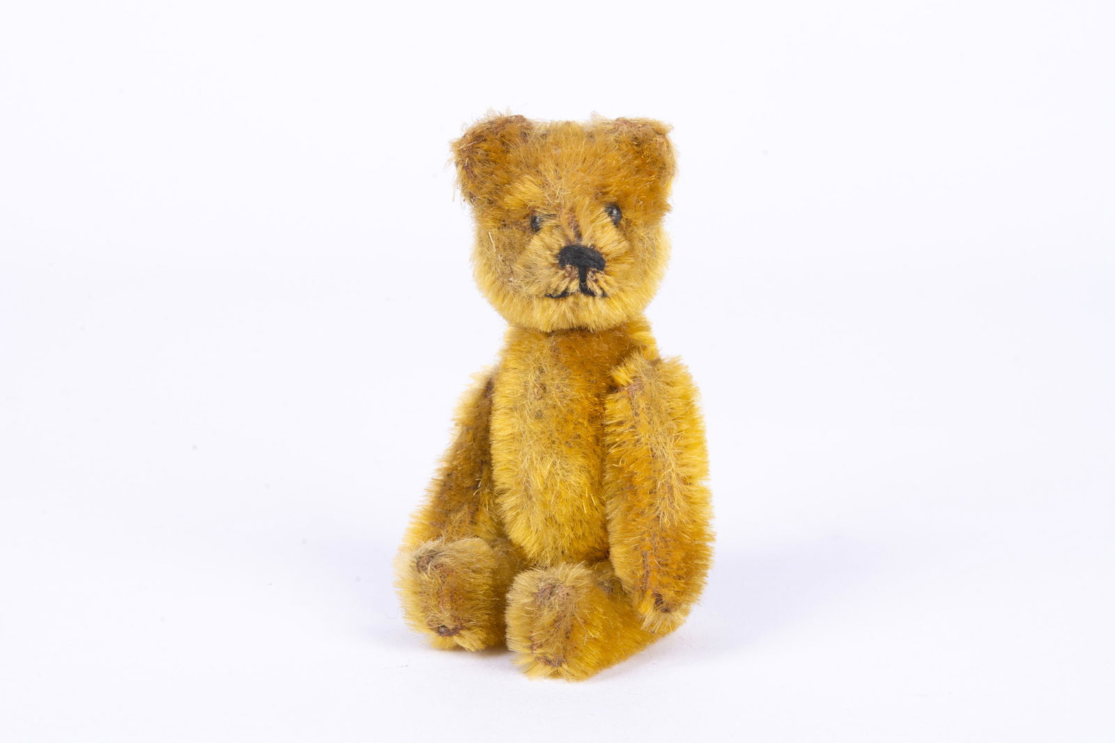 A Schuco Teddy Bear perfume bottle, 1920s, (1 of 3)