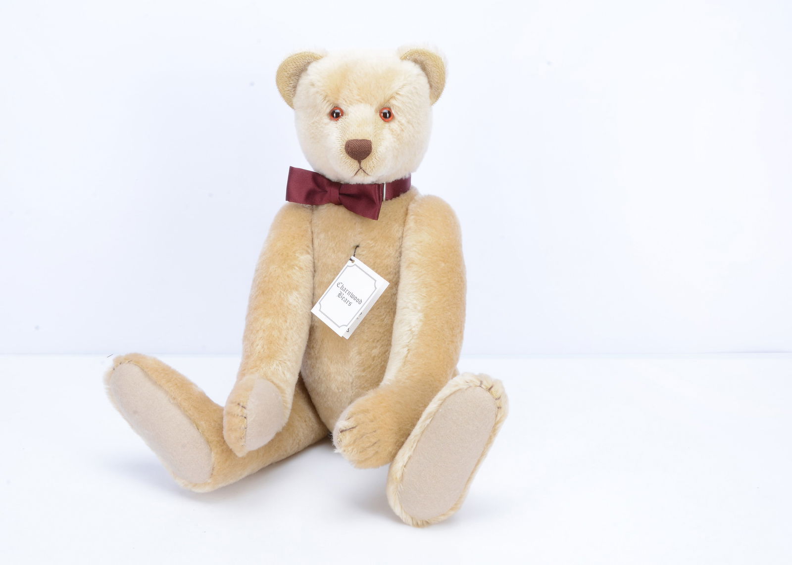 A Charnwood Bears Keynsham teddy bear by Frank Webster,: A Charnwood Bears Keynsham teddy bear by Frank Webster, 8 of 10 with blonde mohair and card certificate —22in. (56cm.) high