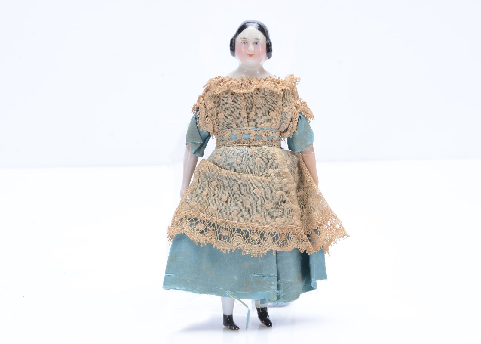 An 19th century German pink tinted china shoulder head dolls’ house doll, (1 of 1)