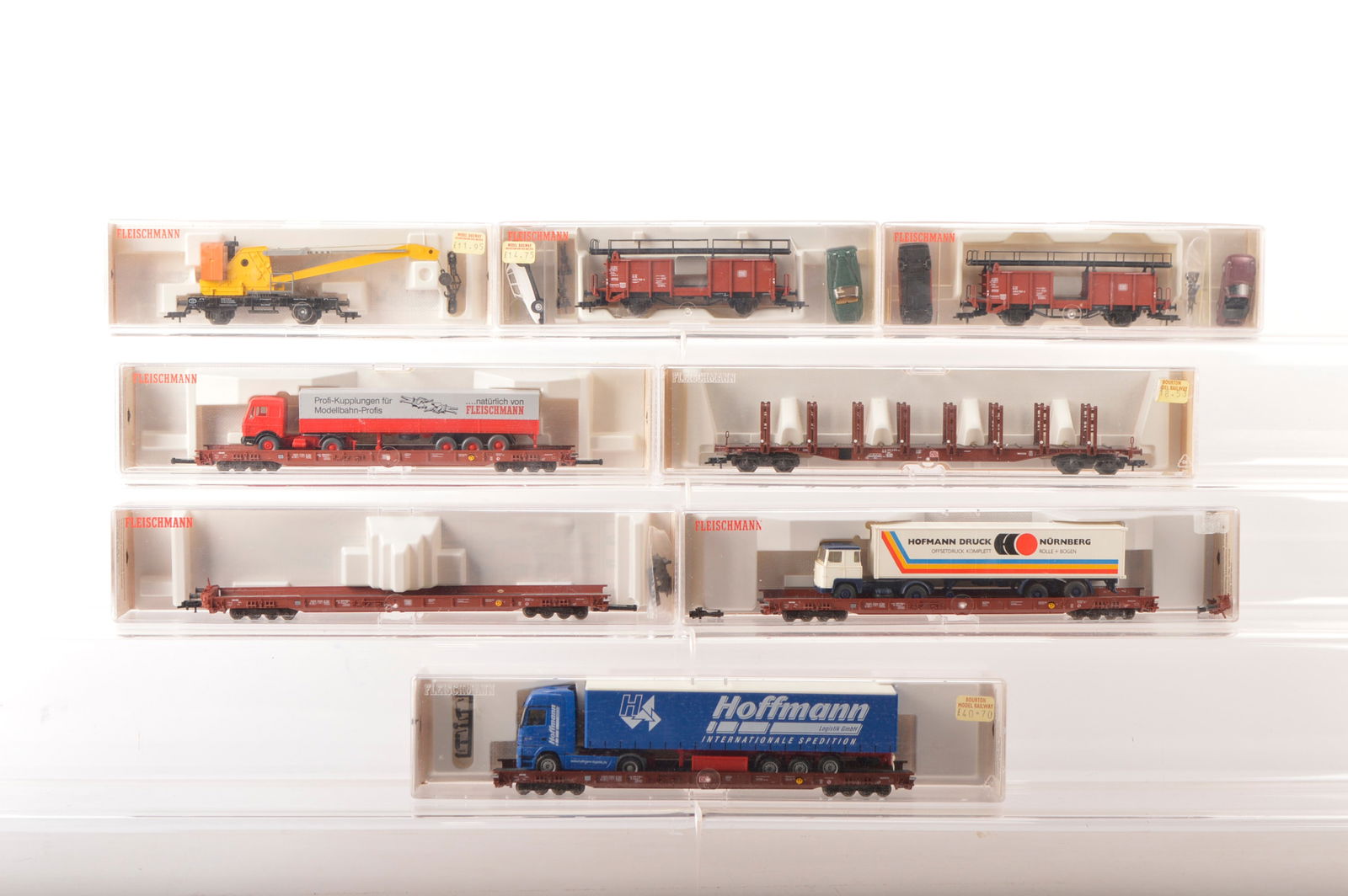 Fleischmann HO Gauge Boxed car and lorry wagons and other trucks (8),: Fleischmann HO Gauge Boxed car and lorry wagons and other trucks (8), 5270 low floor wagon for Lorries, 5275 low flat wagon with Hoffman Lorry, 5276 low flat wagon with Fleischmann Lorry, 5279 low fla
