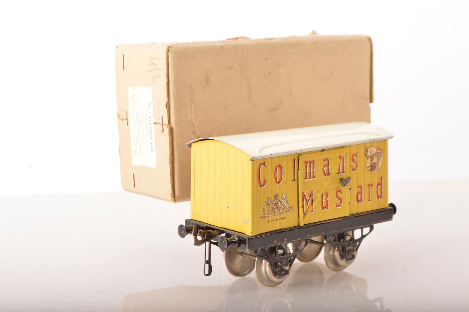 Hornby 0 Gauge 'COLEMAN'S' Mustard Private owner van,: Hornby 0 Gauge 'COLEMAN'S' Mustard Private owner van, a rare van produced for a short period circa 1923/24, Nut and bolt construction, thin nickel axles, nickel wheels and black DLC's, some paint chip