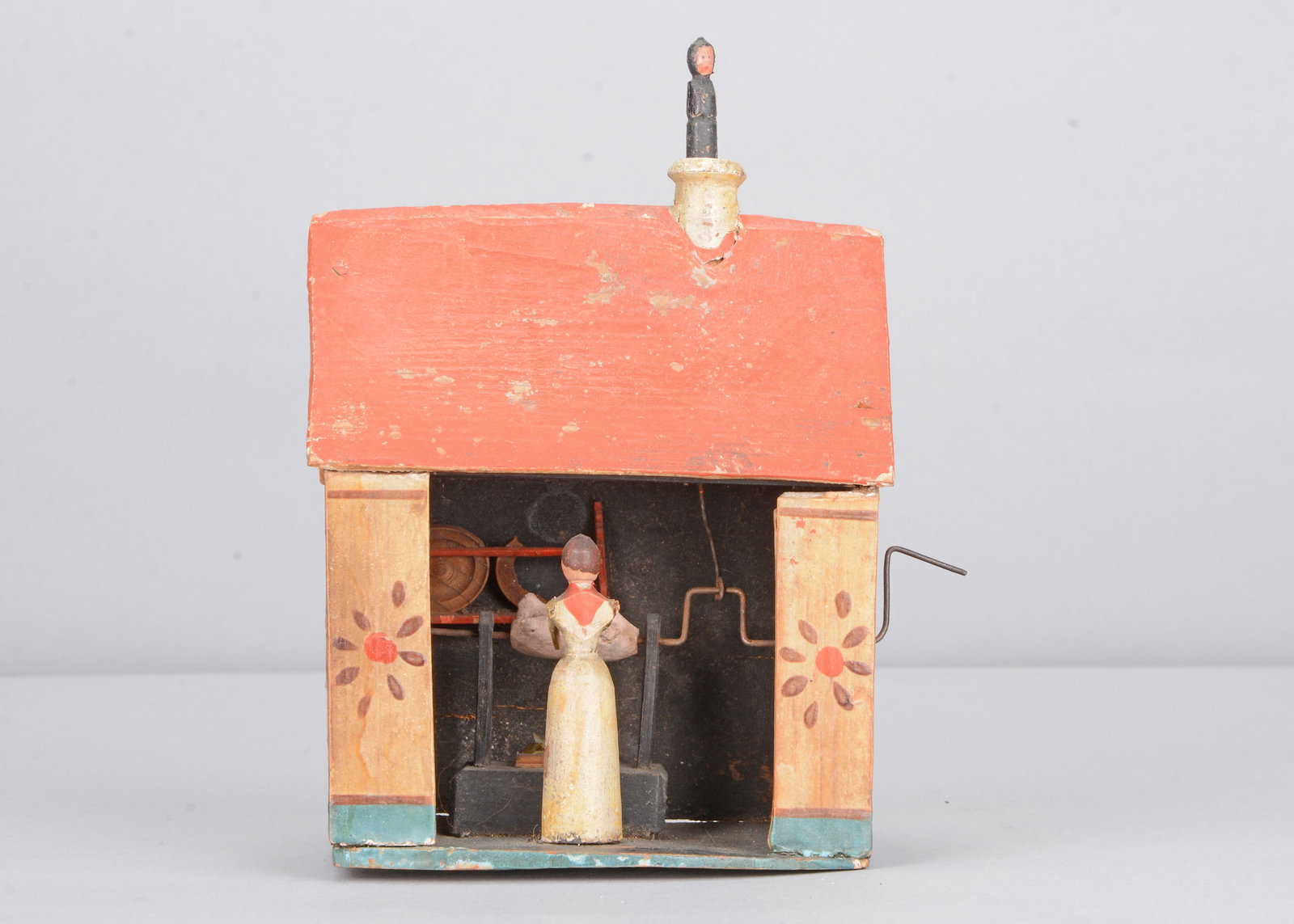 A 19th century Erzgebirge painted wooden kitchen house crank toy, (1 of 6)