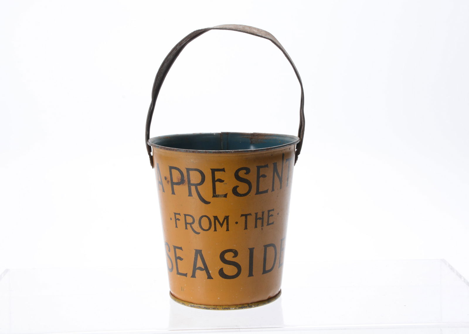 An early 20th century tinplate seaside bucket, (1 of 2)