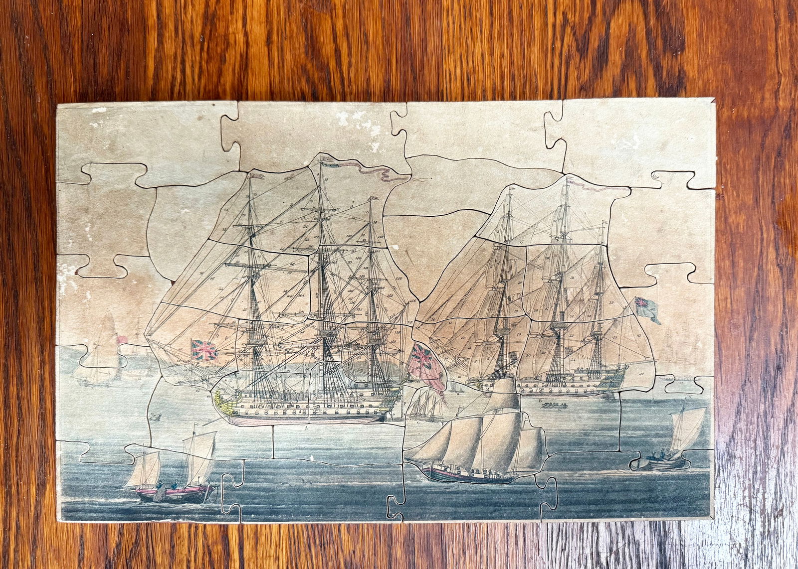 An 19th century E Wallis dissected puzzle ‘Britain’s Bulwarks - a Grand Naval (1 of 2)