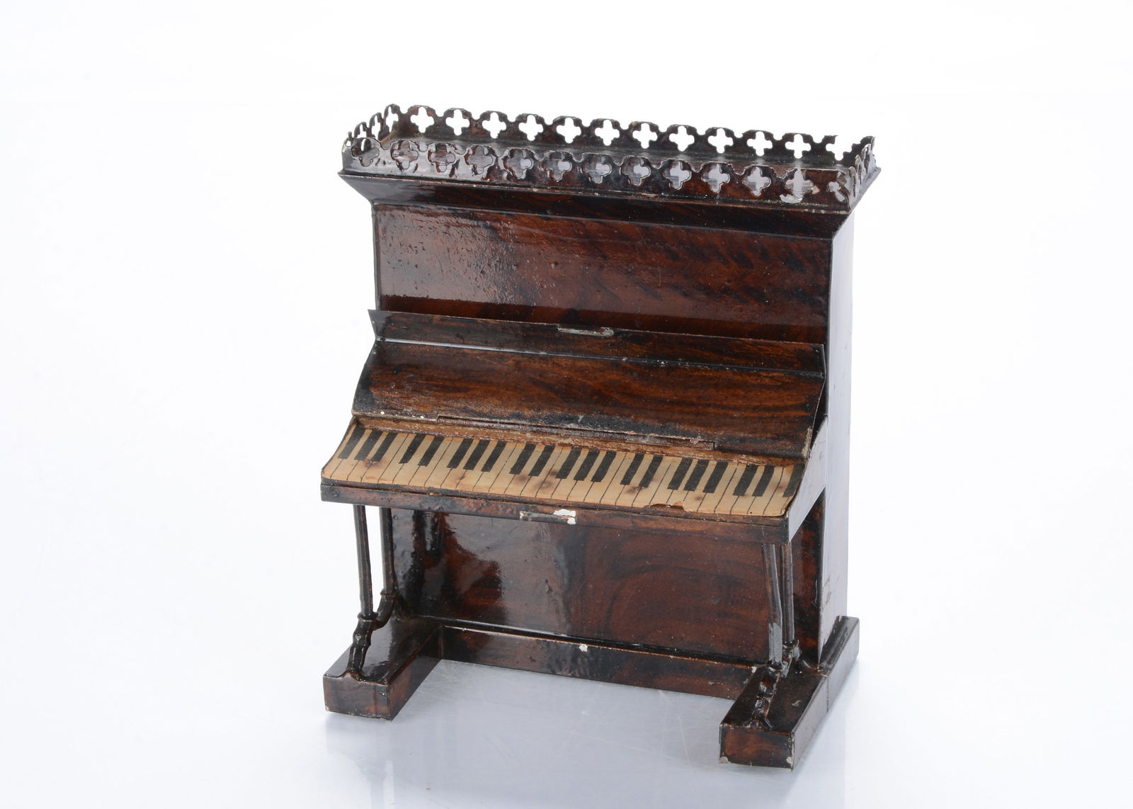 A late 19th century Rock & Graner tinplate dolls’ house upright piano, (1 of 1)