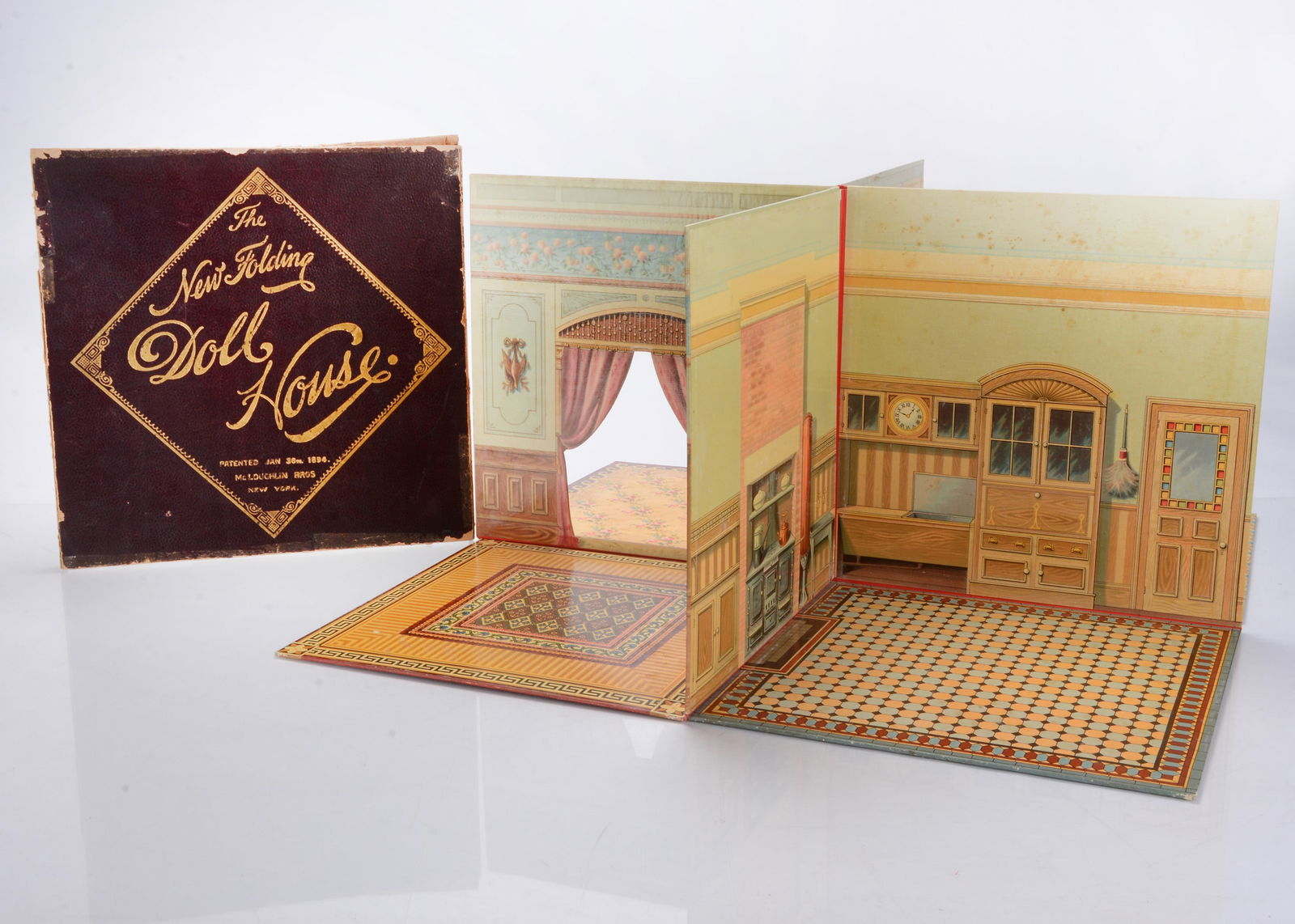A late 19th century McLoughlin Bros ‘The New Folding Doll House, (1 of 2)