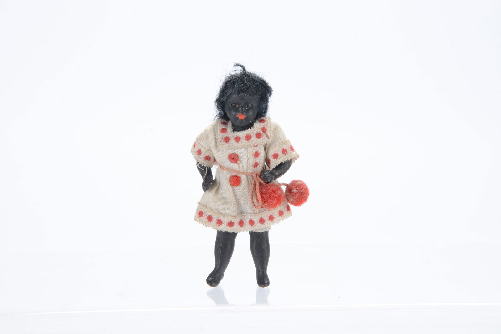A German all-bisque dolls’ house black doll, (1 of 1)