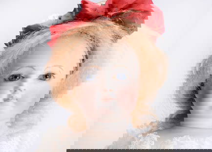A French bisque swivel head fashion doll, having rare French leather covered wooden ball-jointed: A French bisque swivel head fashion doll, having rare French leather covered wooden ball-jointed body, with rare kid covered wooden ball-jointed body, fixed blue glass eyes, finely feathered eyebrows,