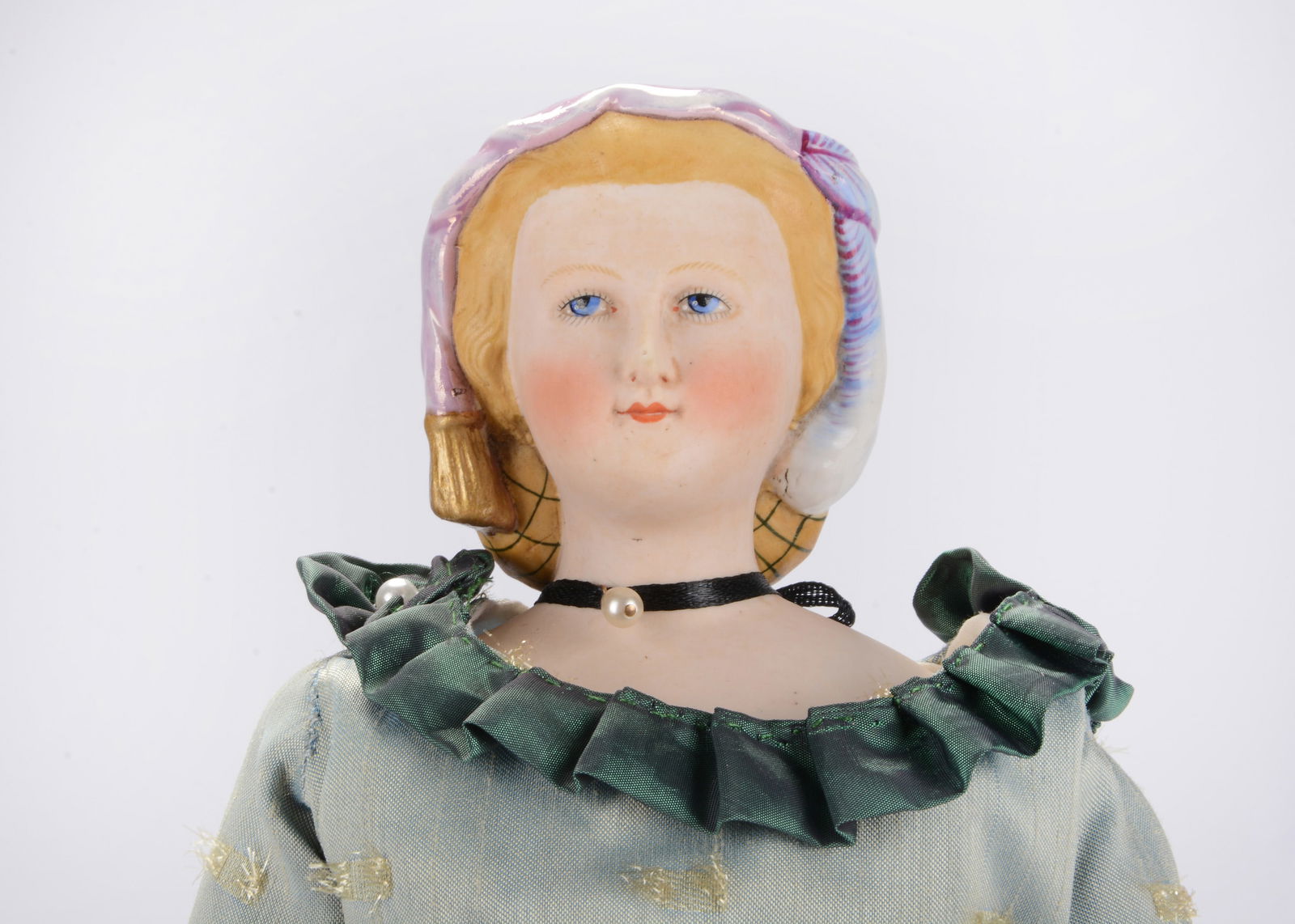 A fine and rare bisque shoulder-head doll, (1 of 2)