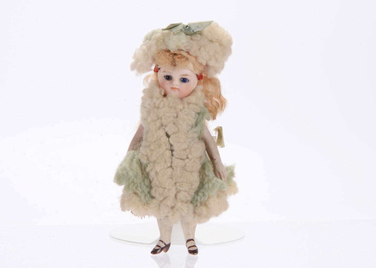 A Simon & Halbig all-bisque mignonette dolls’ house doll,: A Simon & Halbig all-bisque mignonette dolls’ house doll, with fixed blue glass eyes, closed mouth, long blonde mohair wig, five-piece body, dressed in pale turquoise and off-white woollen dress