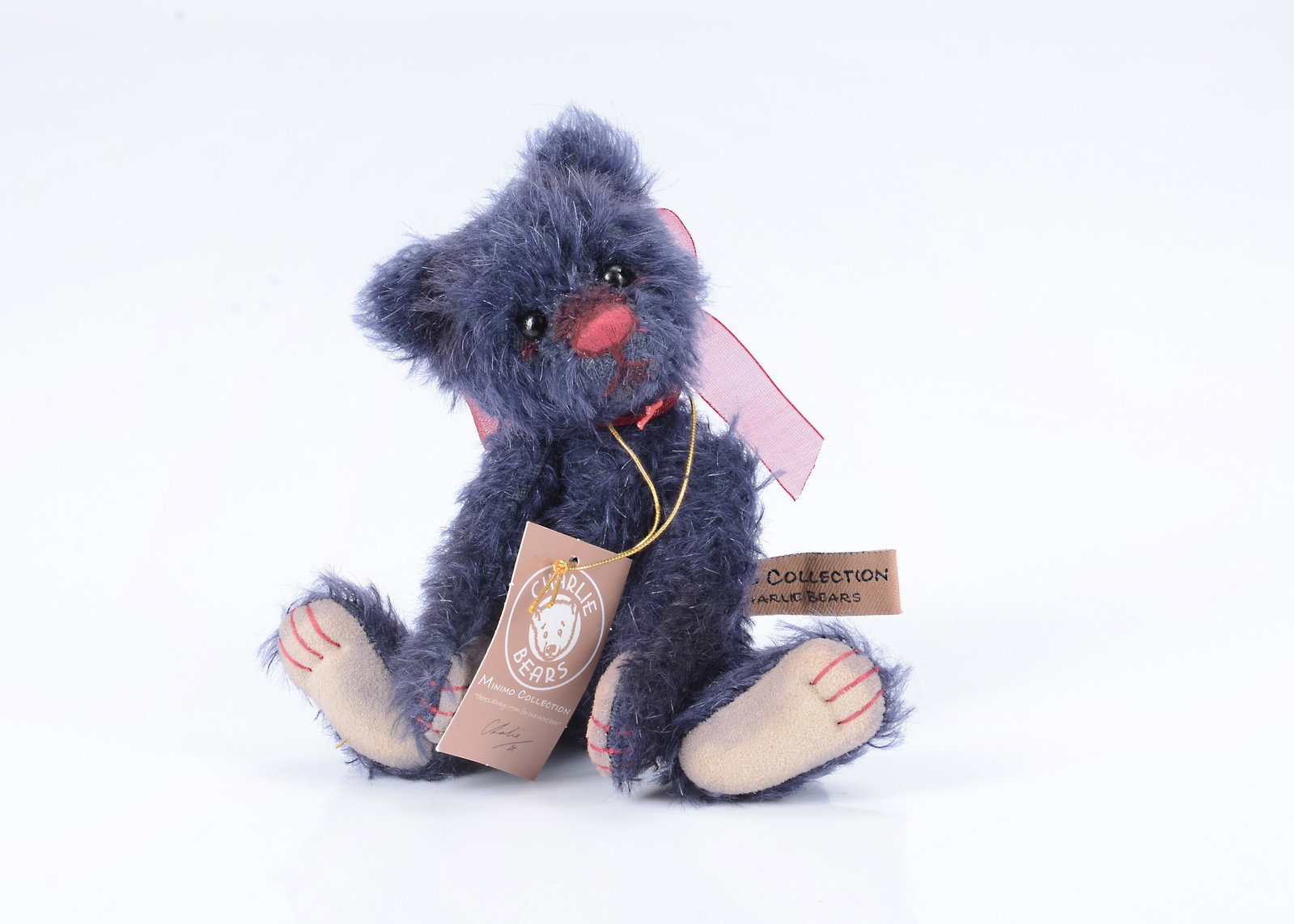 A Charlie Bear Minimo Midnight teddy bear, (1 of 2)