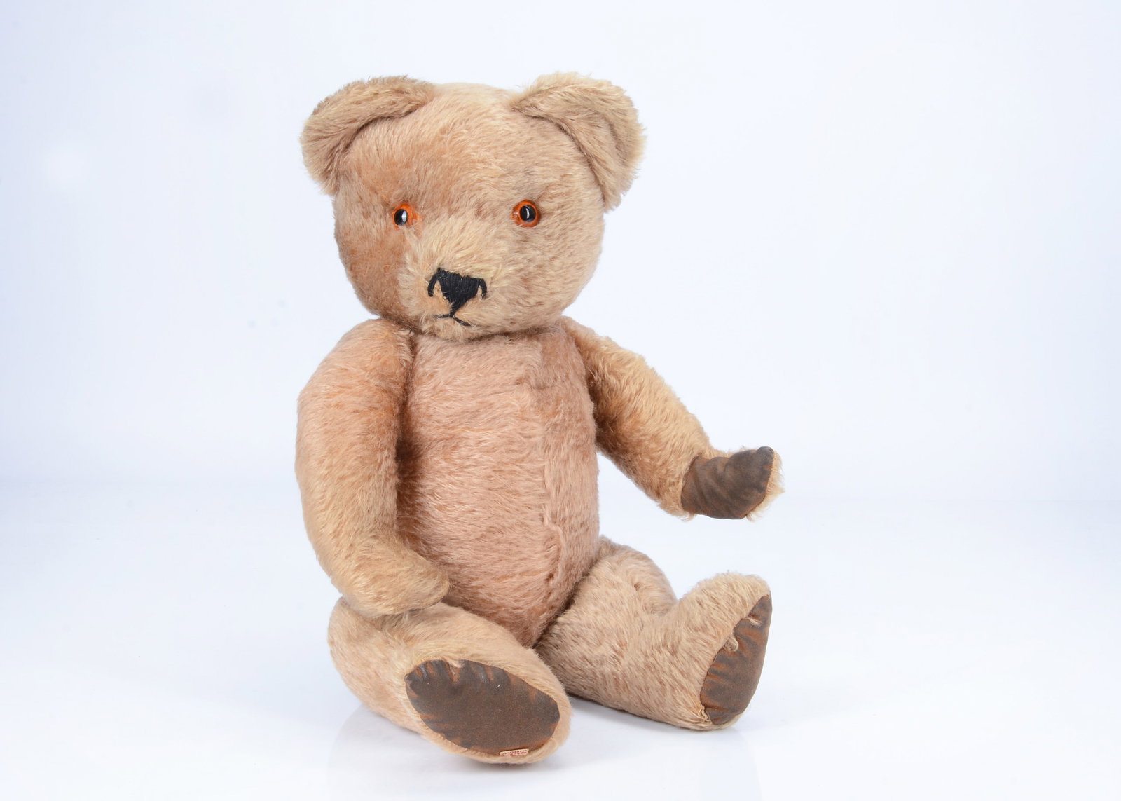 Findlay, a caramel brown Tara Toys musical teddy bear, (1 of 2)