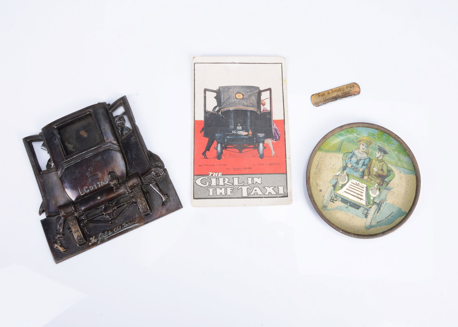 A ‘The Girl in a Taxi’ bronze calendar, (1 of 2)