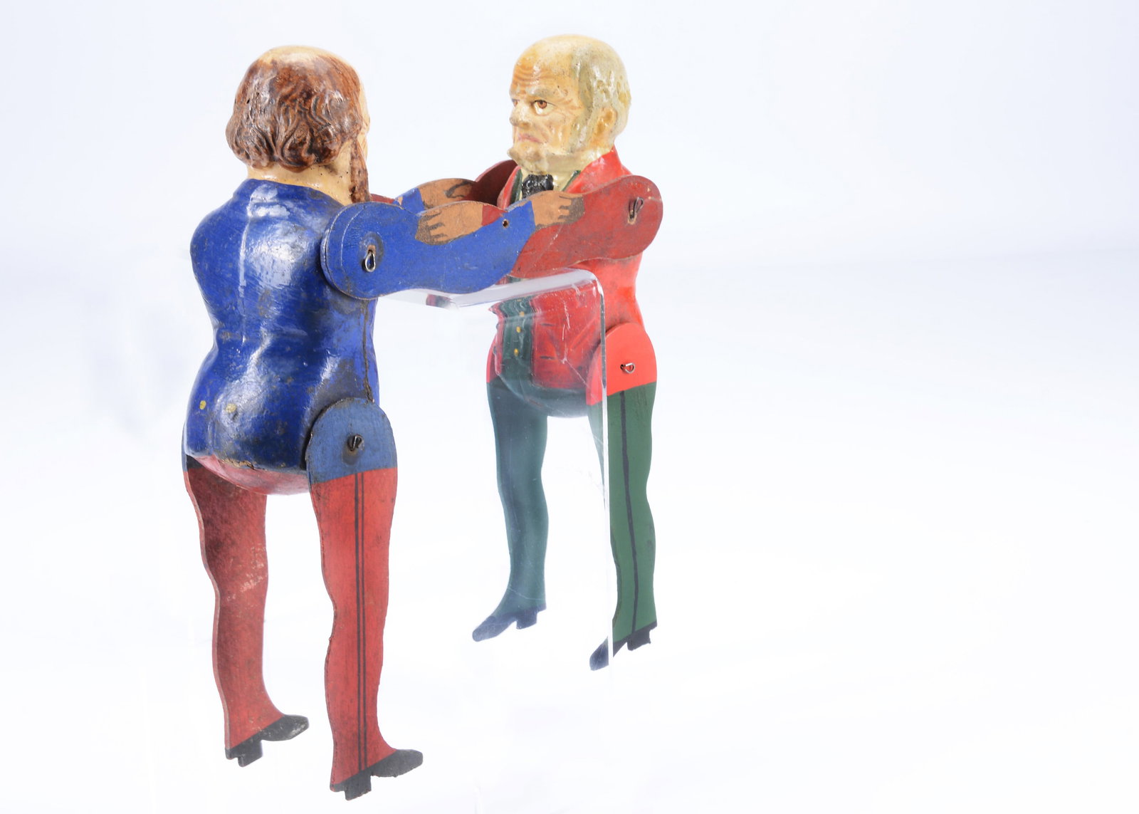 A late 19th century Albin Amende Sonneberg British Prime Minister political wrestling toy,: A late 19th century Albin Amende Sonneberg British Prime Minister political wrestling toy, papier-mâché painted figures with jointed wooden limbs the arms attached and printed paper laid on 
