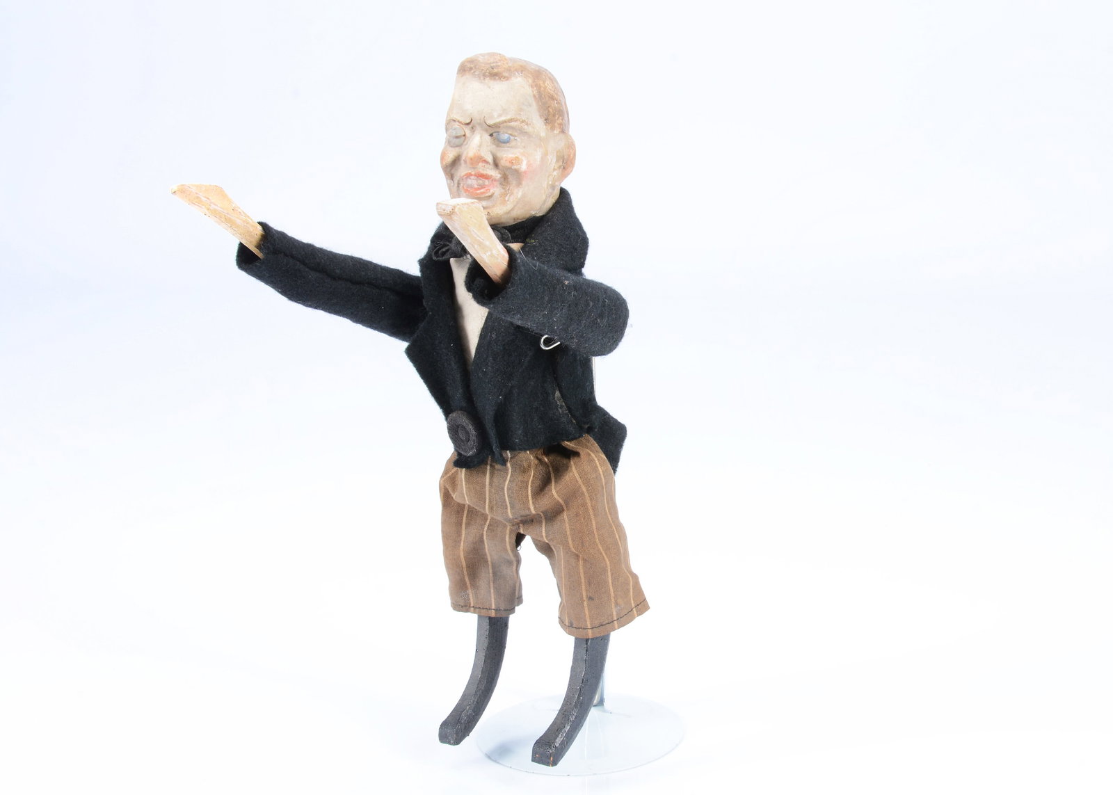 An early 20th century German composition headed Joseph Chamberlain clockwork tumbling toy, (1 of 2)
