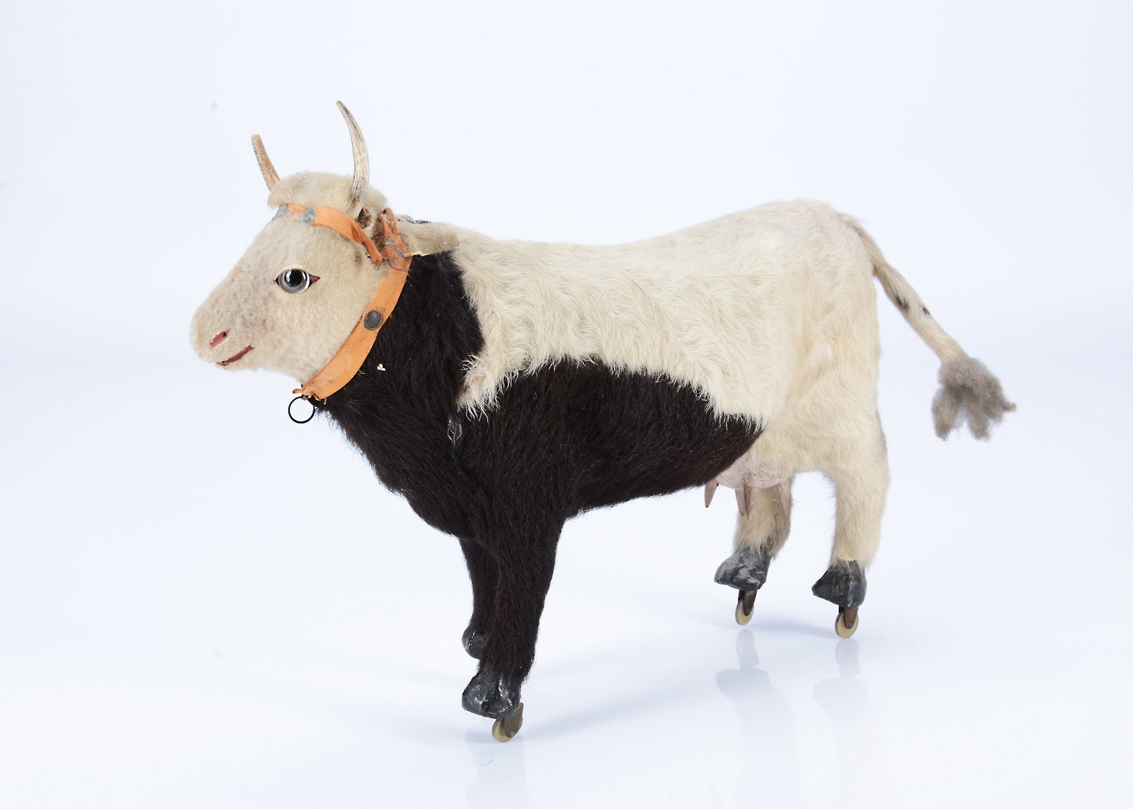 A late 19th century toy skin covered cow, (1 of 1)