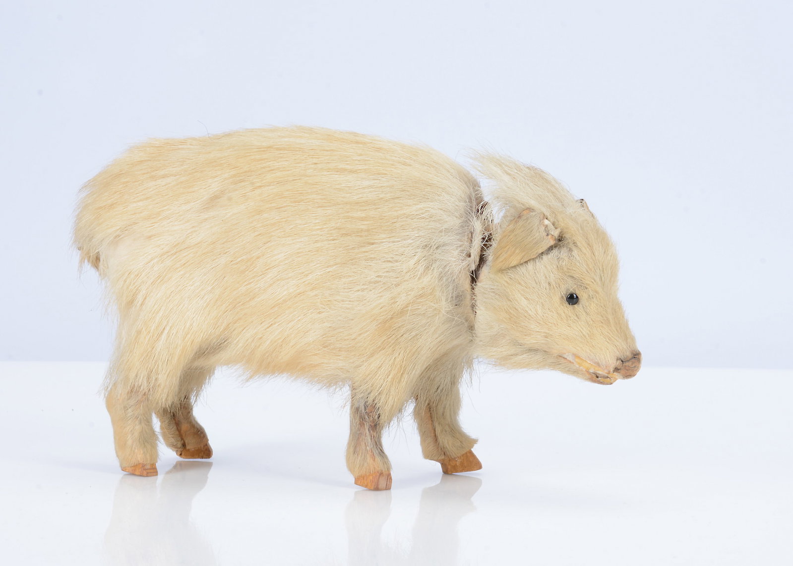 An 19th century German fur-covered pig candy container, (1 of 2)