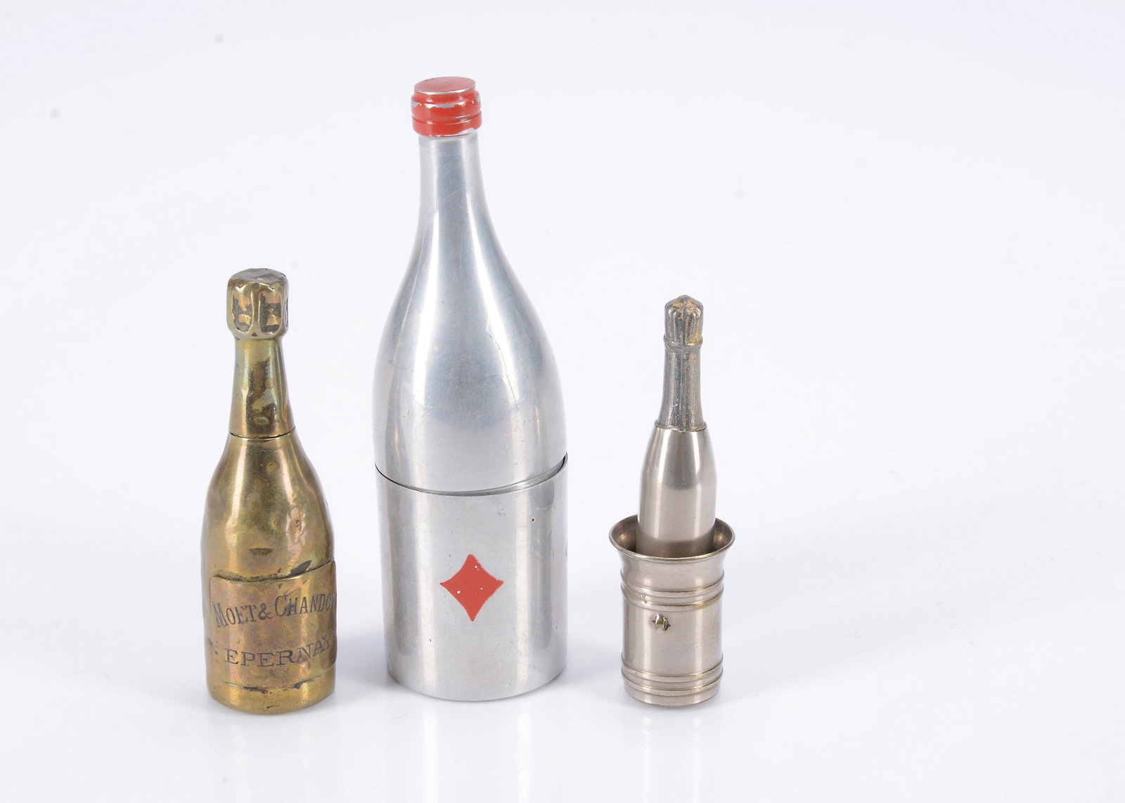 Three metal champagne bottle dice holders, (1 of 1)