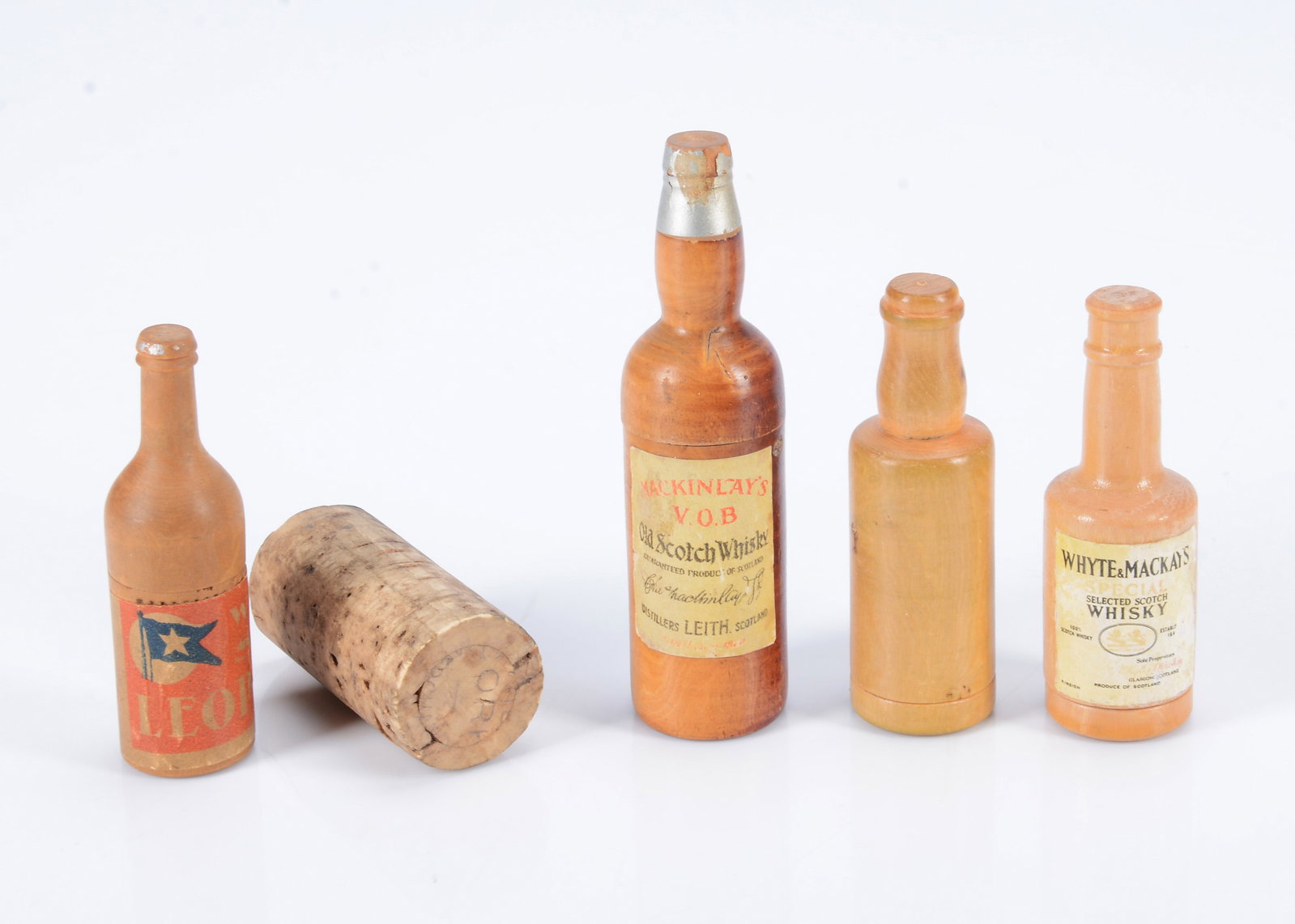 Four turned wooden alcohol bottle dice holders, (1 of 1)