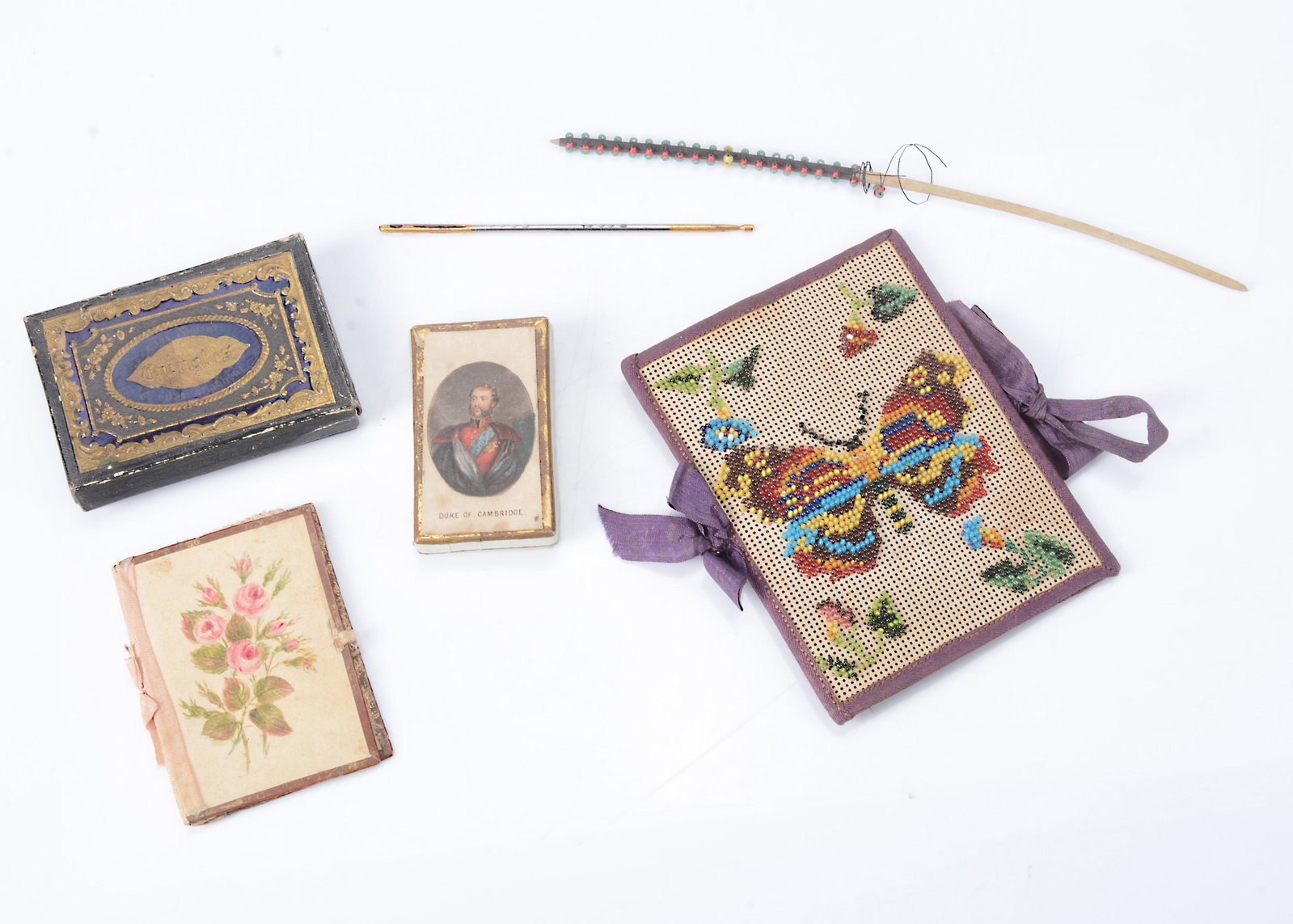 An 19th century beadwork on paper needle case depicting a butterfly, (1 of 1)