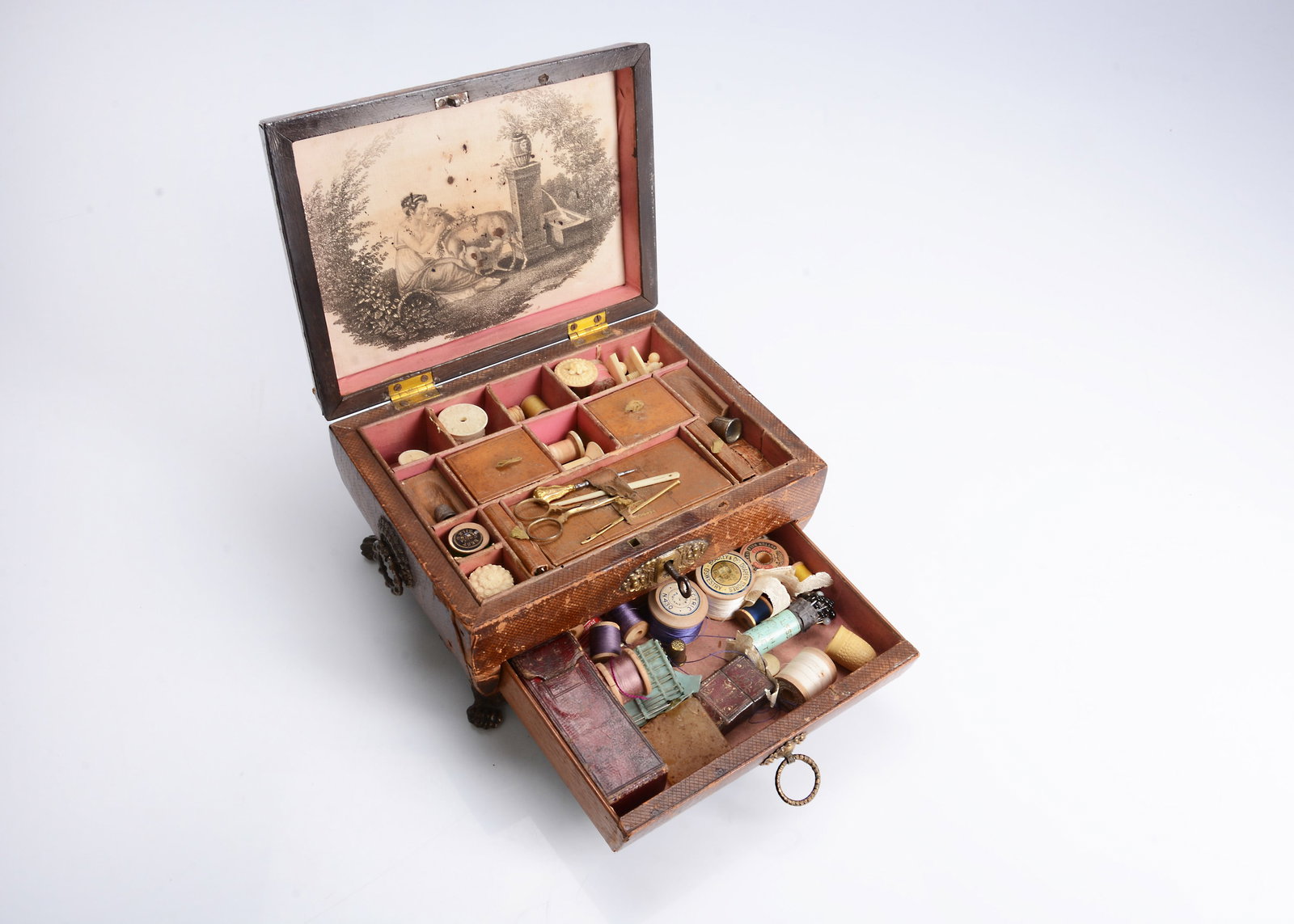 An early 19th century brown leather covered sewing box, (1 of 3)