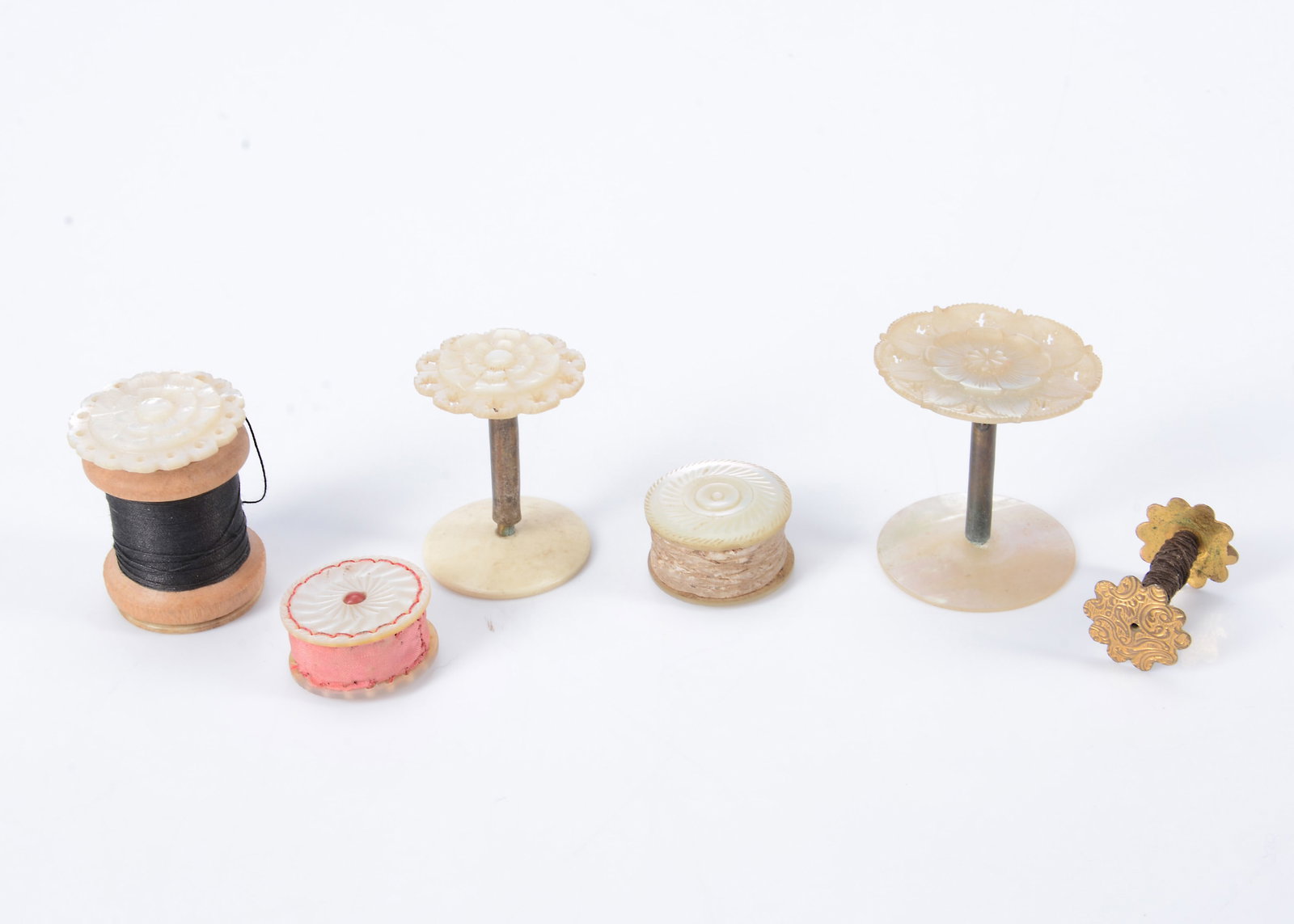 Three 19th century mother of pearl cotton holders, (1 of 1)