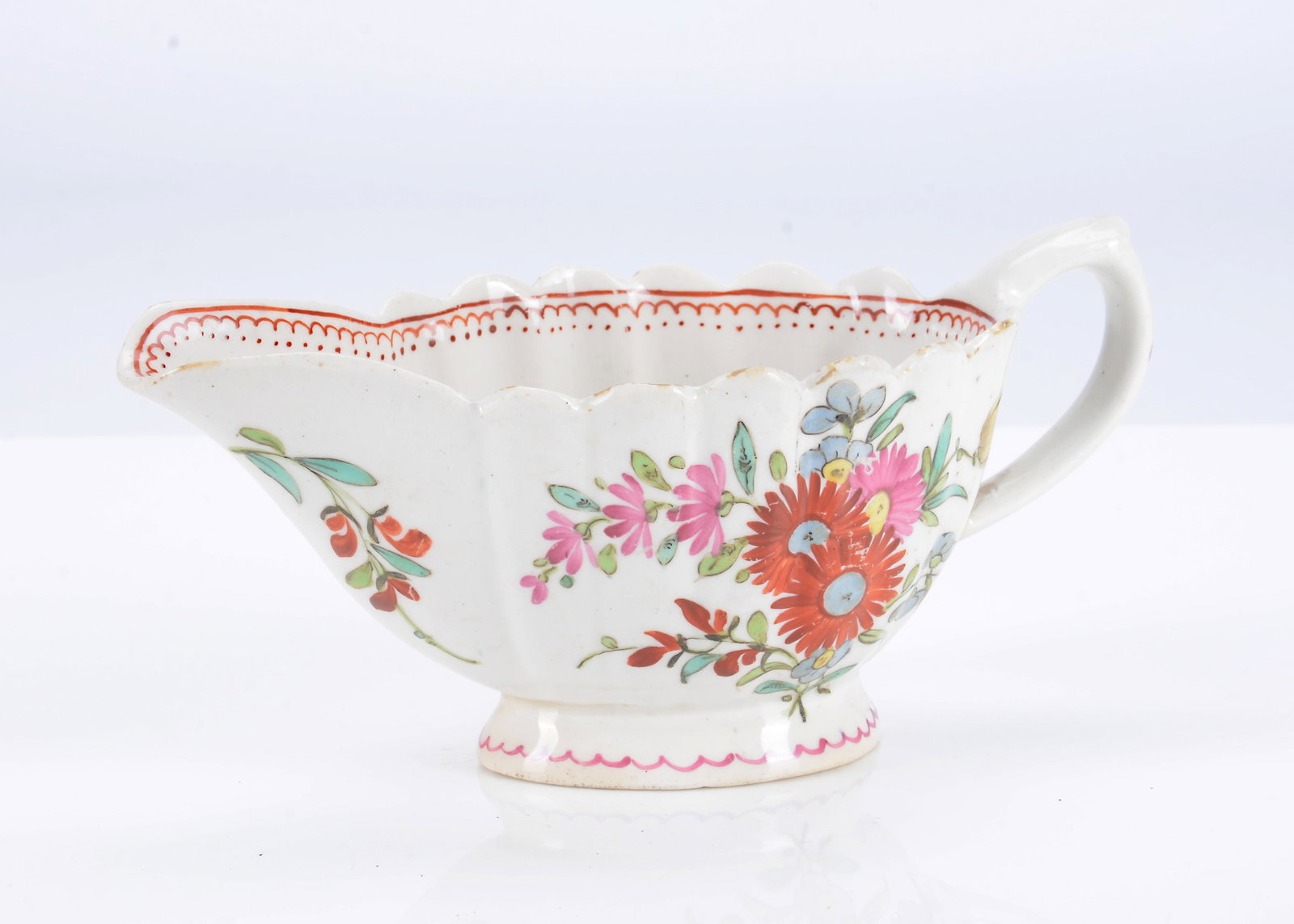 A Bow porcelain fluted sauce boat, circa 1765, (1 of 2)