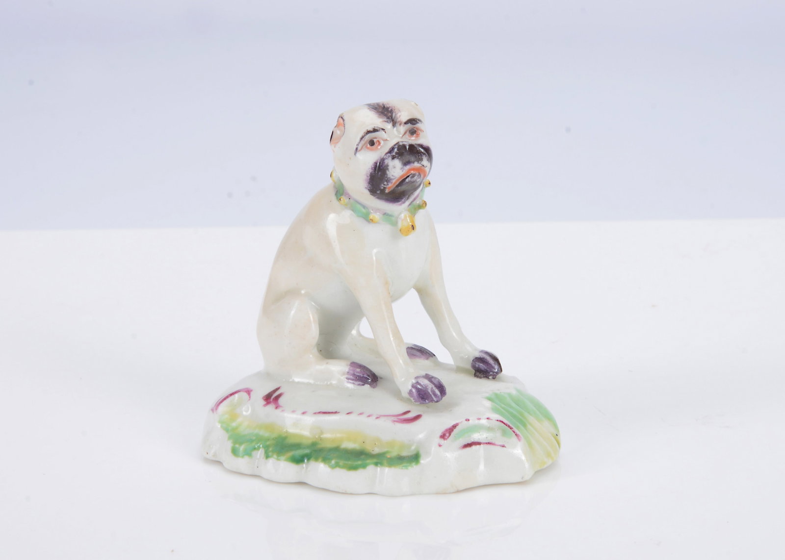 A Derby porcelain seated pug dog, 1750s, (1 of 2)