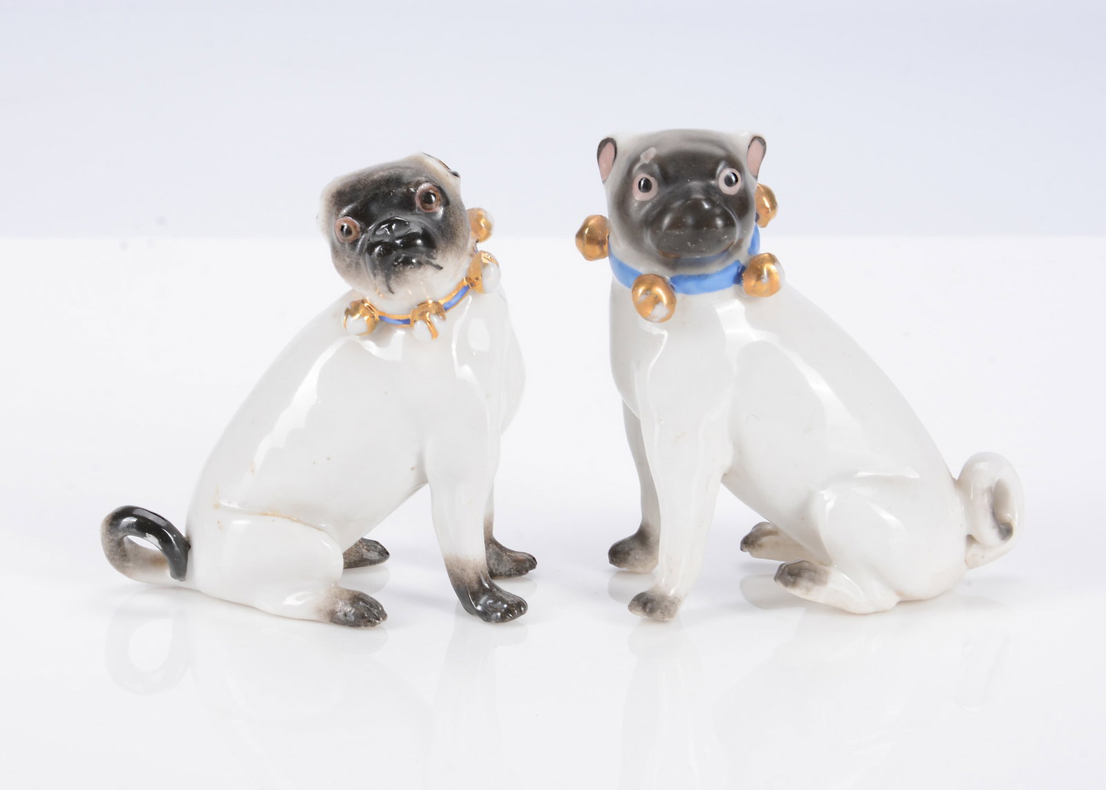 Two late 19th century German porcelain pug dogs, (1 of 2)