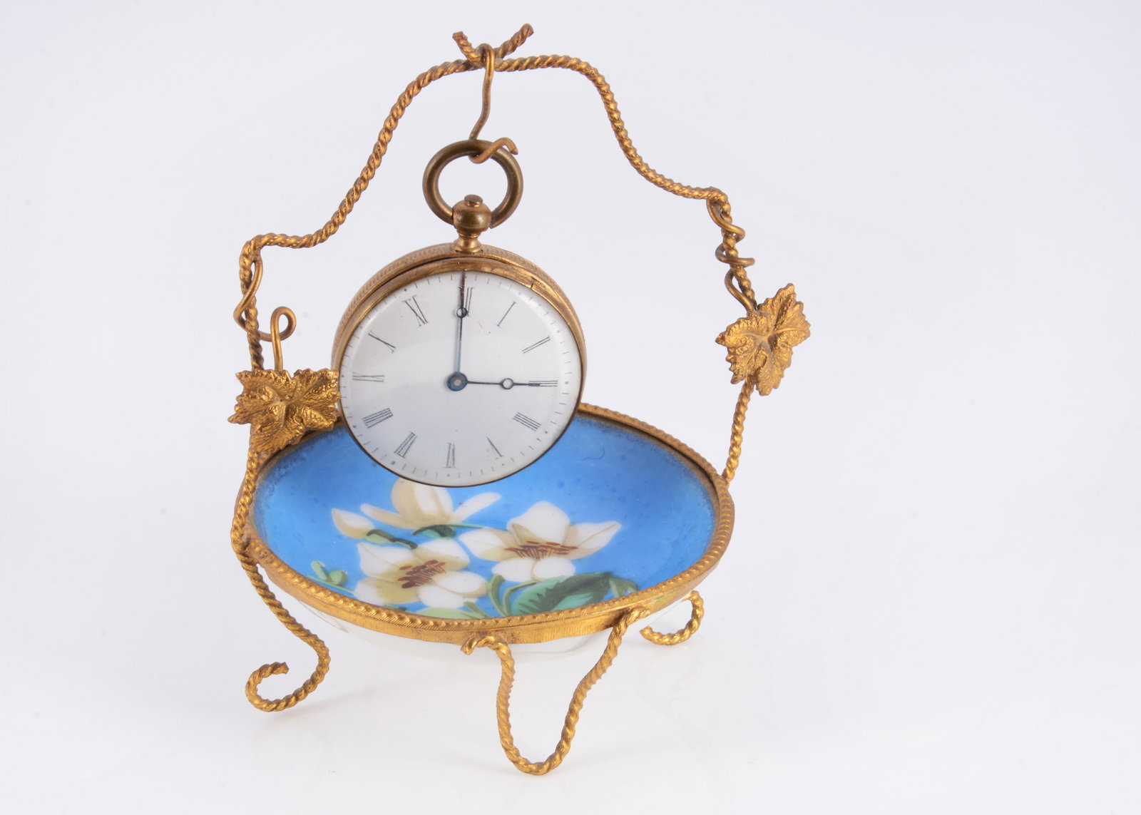 A rare 19th century toy pocket watch purse,: A rare 19th century toy pocket watch purse, with white enamel dial, non-working hands set at three o’clock, the back with black enamel and red flower, opening to reveal a purple lined purse R