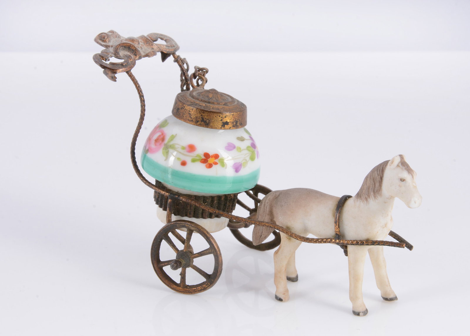 An unusual late 19th century lady’s horse-drawn inkwell, (1 of 2)