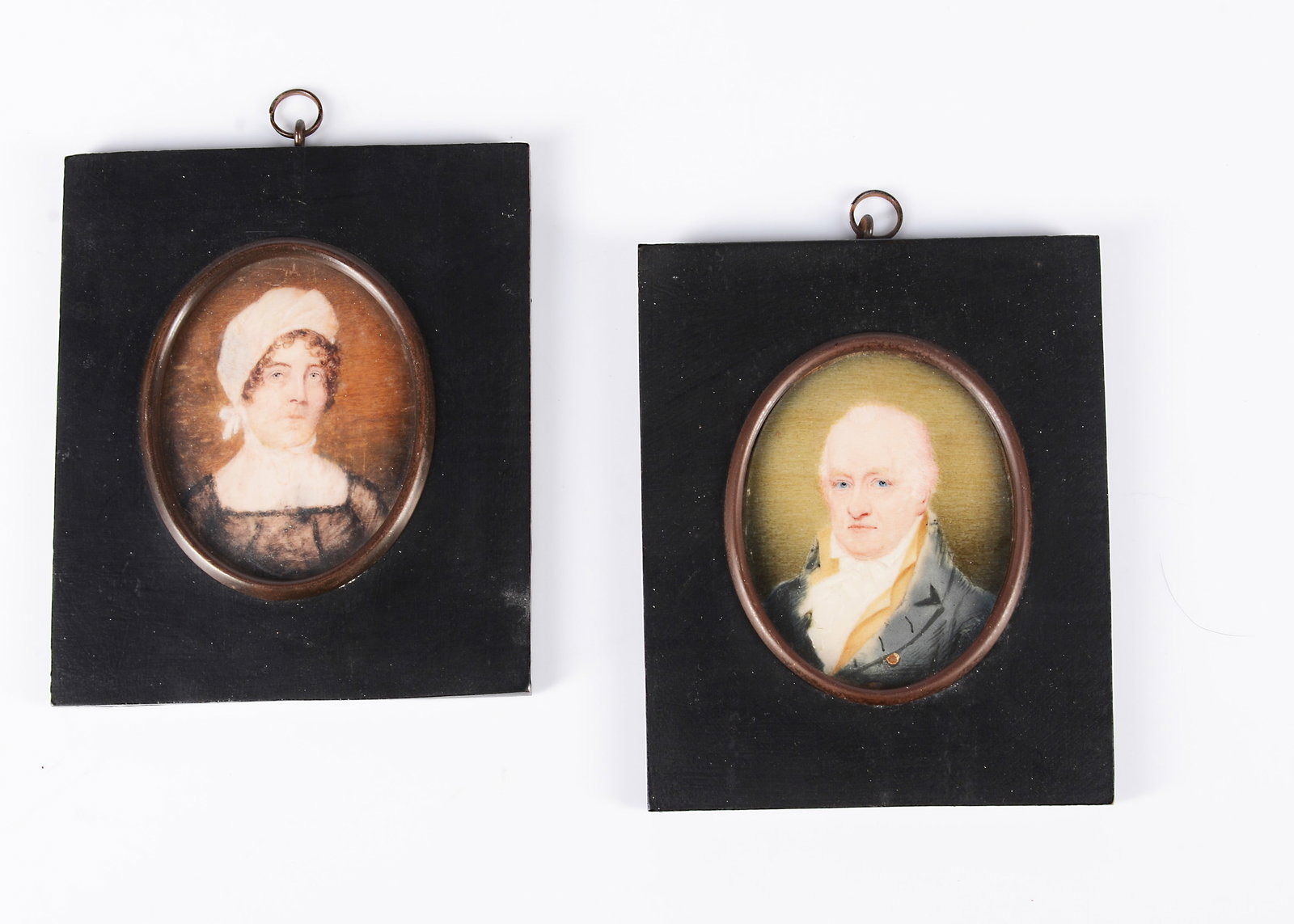 Two early 19th century portrait miniatures on ivory by Harriet Wilkins,: Two early 19th century portrait miniatures on ivory by Harriet Wilkins, a portrait of older gentleman in grey coat ad yellow waistcoat, signed and dated 1807 on card back; and ‘Portrait of M Nyu