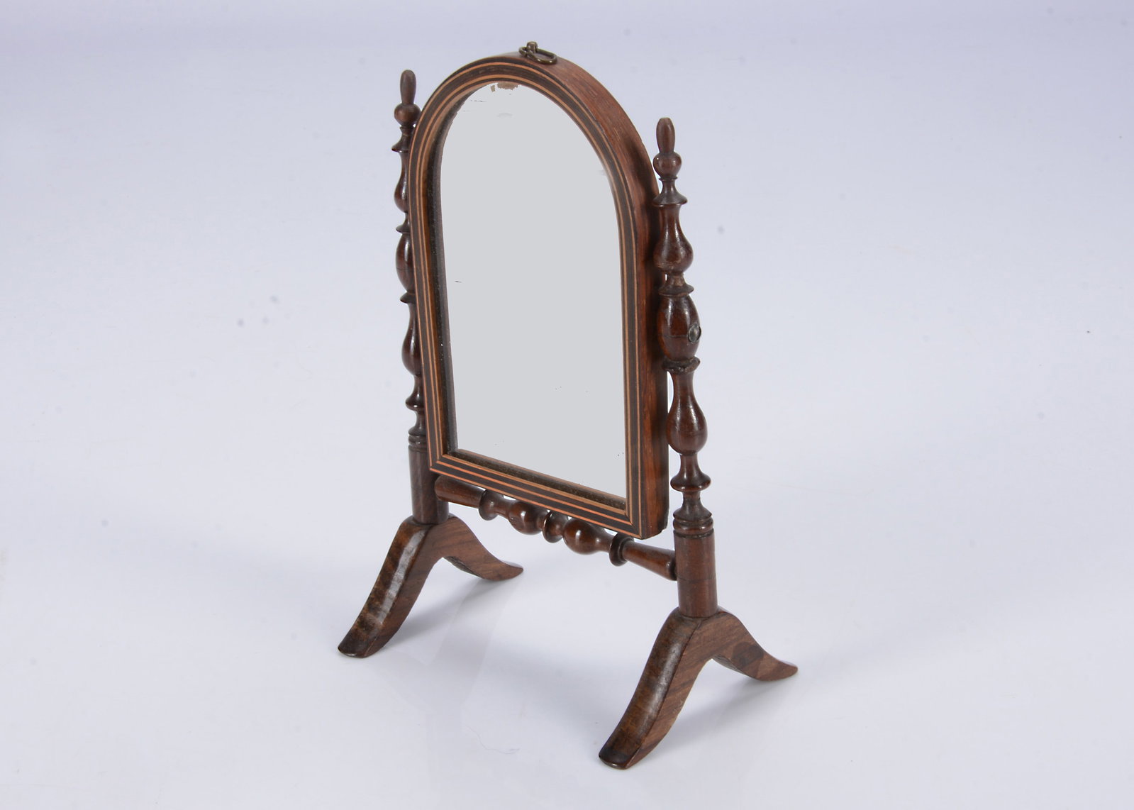 An 19th century doll’s toilet mirror, (1 of 2)