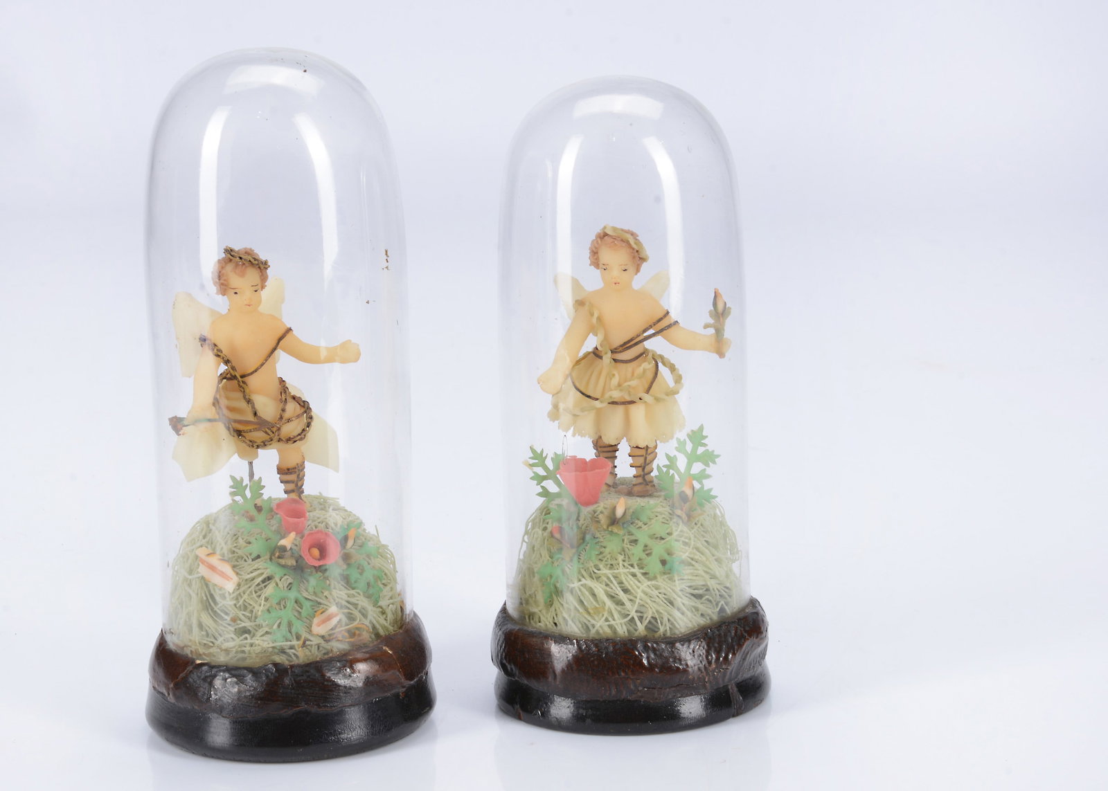 A rare pair of 19th century wax cherub figures under glass domes, (1 of 1)