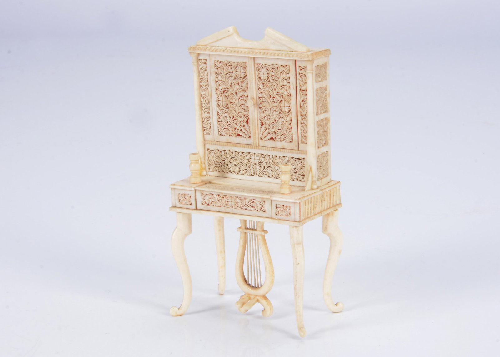 A rare 19th century bone doll’s house pianola cabinet, (1 of 2)